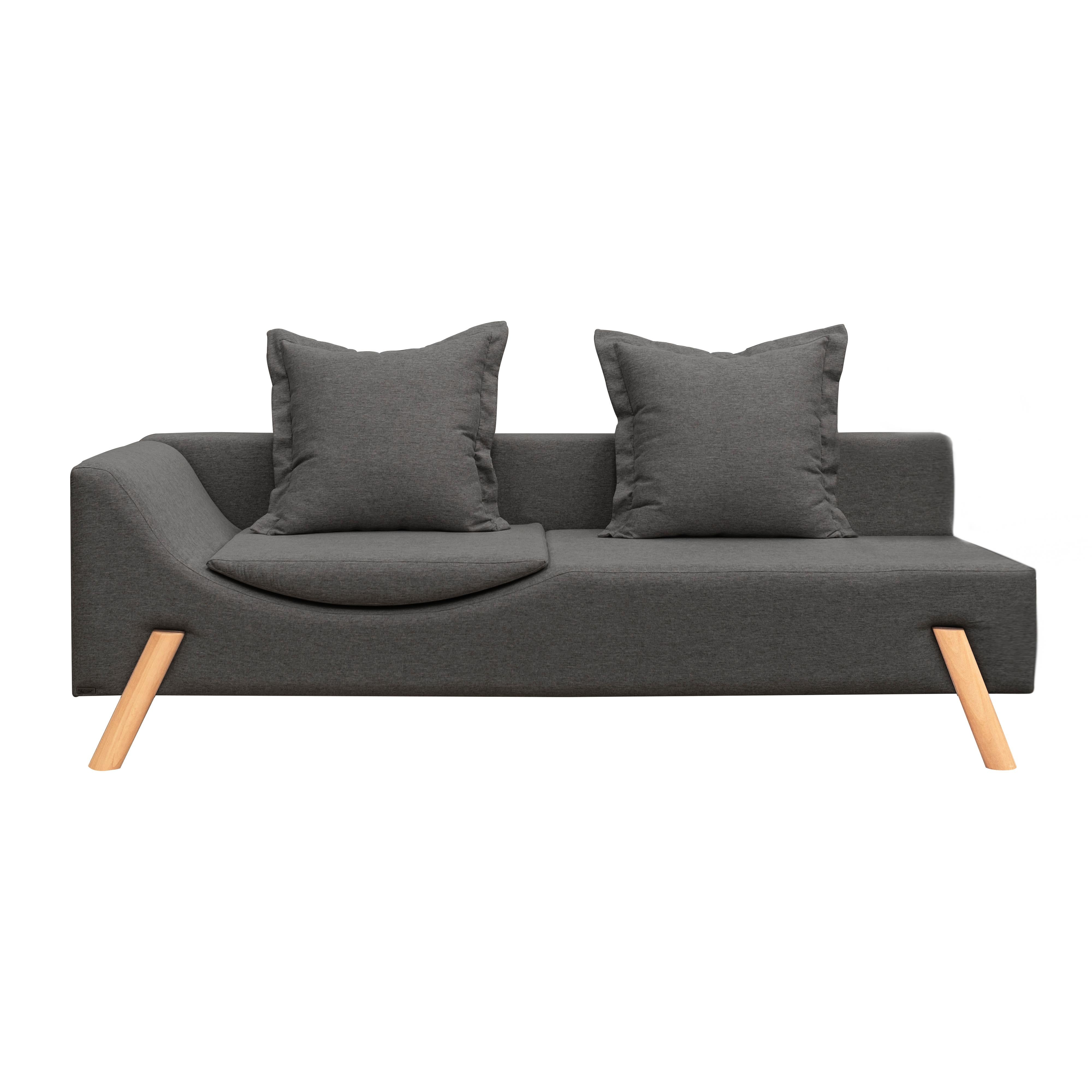 The Flag Couch is a smart and multifunctional piece.
The couch has a cushion built into the seat that makes the piece with dual functionality: when is closed, it works as a comfortable living sofa to seat, and when is opened it becomes a chaise