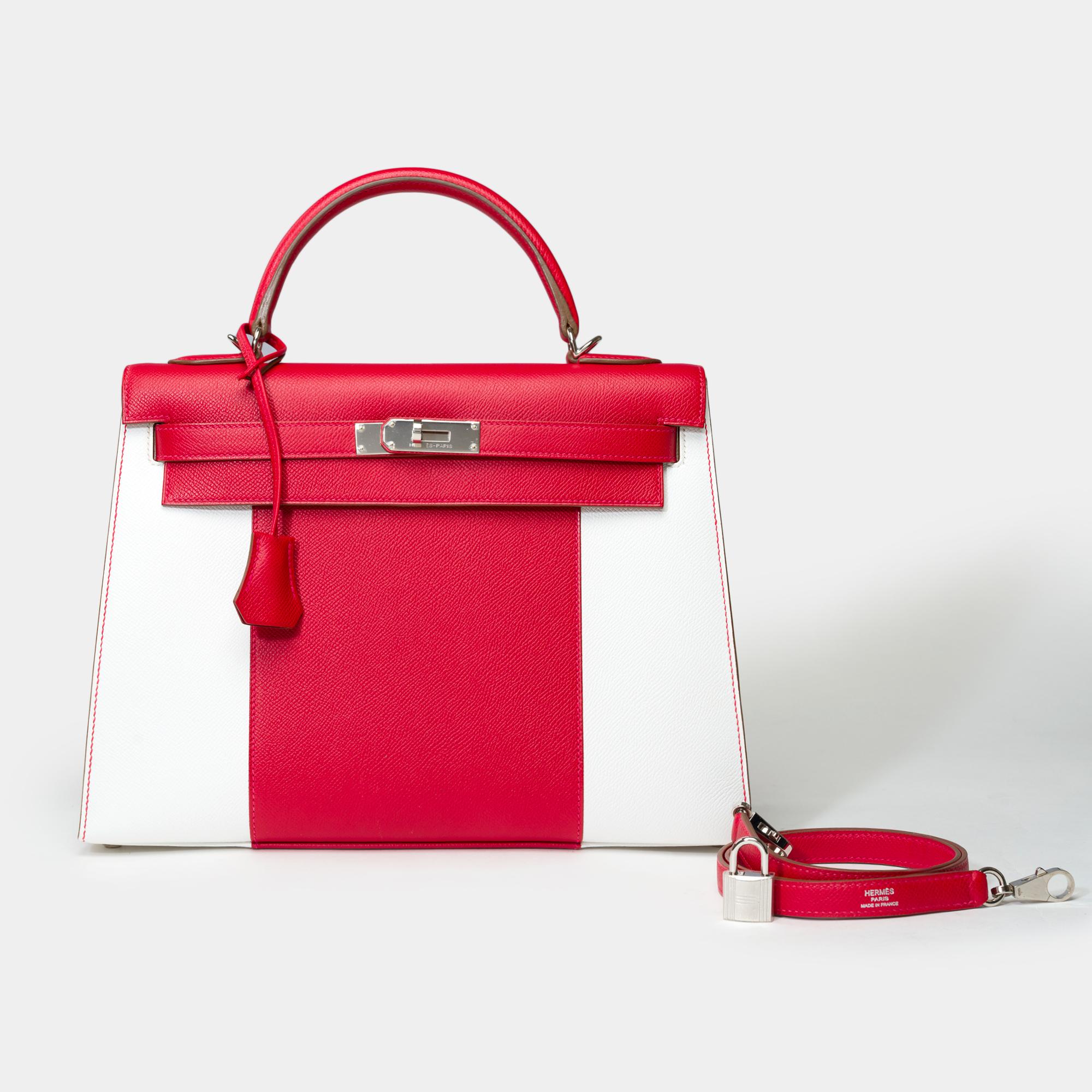 ULTRA​ ​RARE/COLLECTIBLE​ ​KELLY​ ​FLAG

Splendid​ ​&​ ​Rare​ ​Hermes​ ​Kelly​ ​32​ ​sellier​ ​handbag​ ​strap​ ​Flag​ ​limited​ ​edition​ ​in​ ​white​ ​and​ ​casaque​ ​red​ ​epsom​ ​leather​ ​,​ ​palladium​ ​silver​ ​metal​ ​trim,​ ​red​ ​leather​