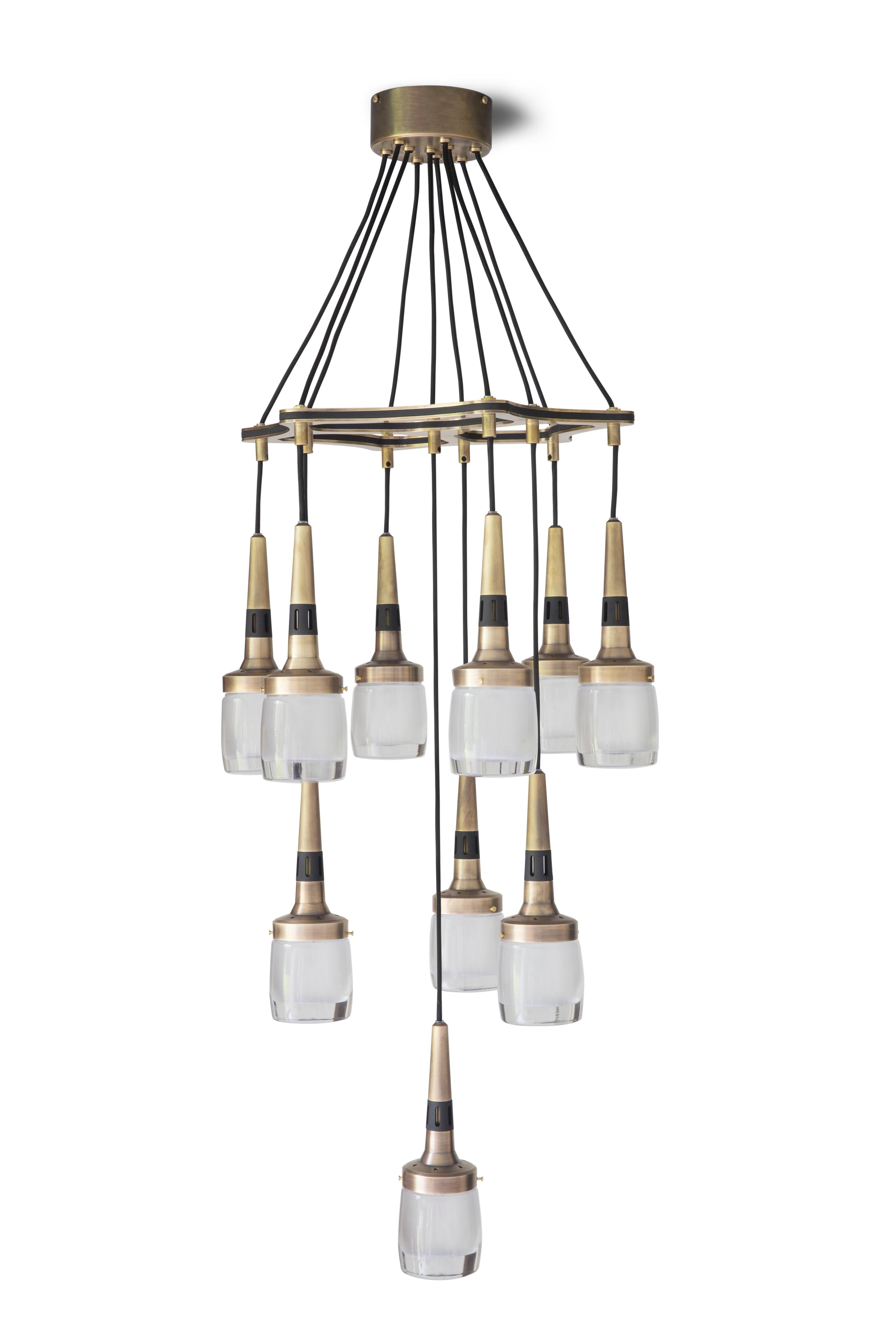 Flagon chandelier 10 by Bert Frank
Dimensions: 80-200 x 40 x 11.6 cm
Materials: Brass, steel

Brushed Brass lacquered as standard, custom finishes available
All our lamps can be wired according to each country. If sold to the USA it will be wired