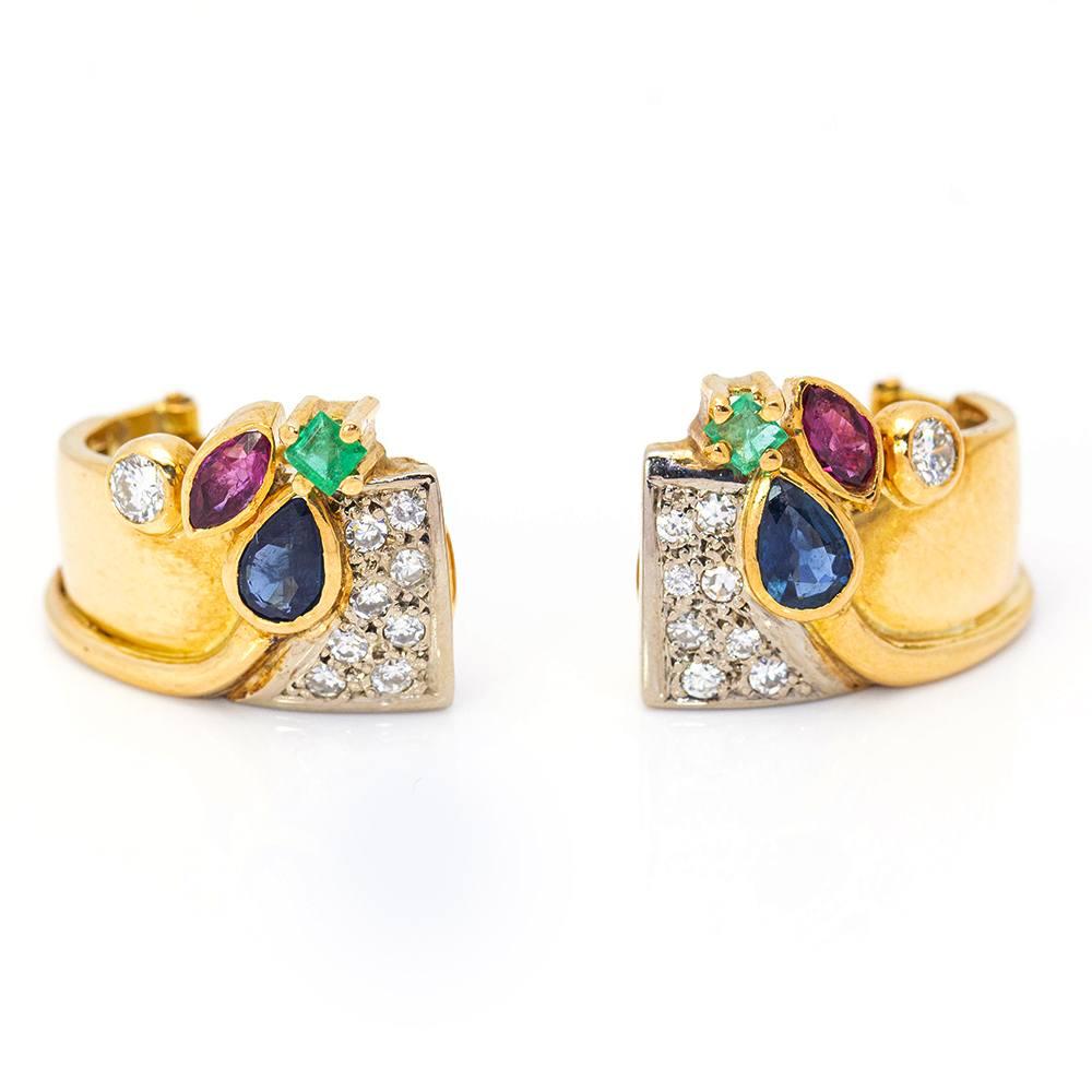 Earrings in Yellow Gold and Precious Stones for woman  16x Brilliant Cut Diamonds with a total weight approx. of 0,35cts  2x Emeralds, 2x Sapphires, 2x Rubies with a total weight approx. of 0,50cts  Omega Clasp  Yellow Gold and 18kt White Gold 