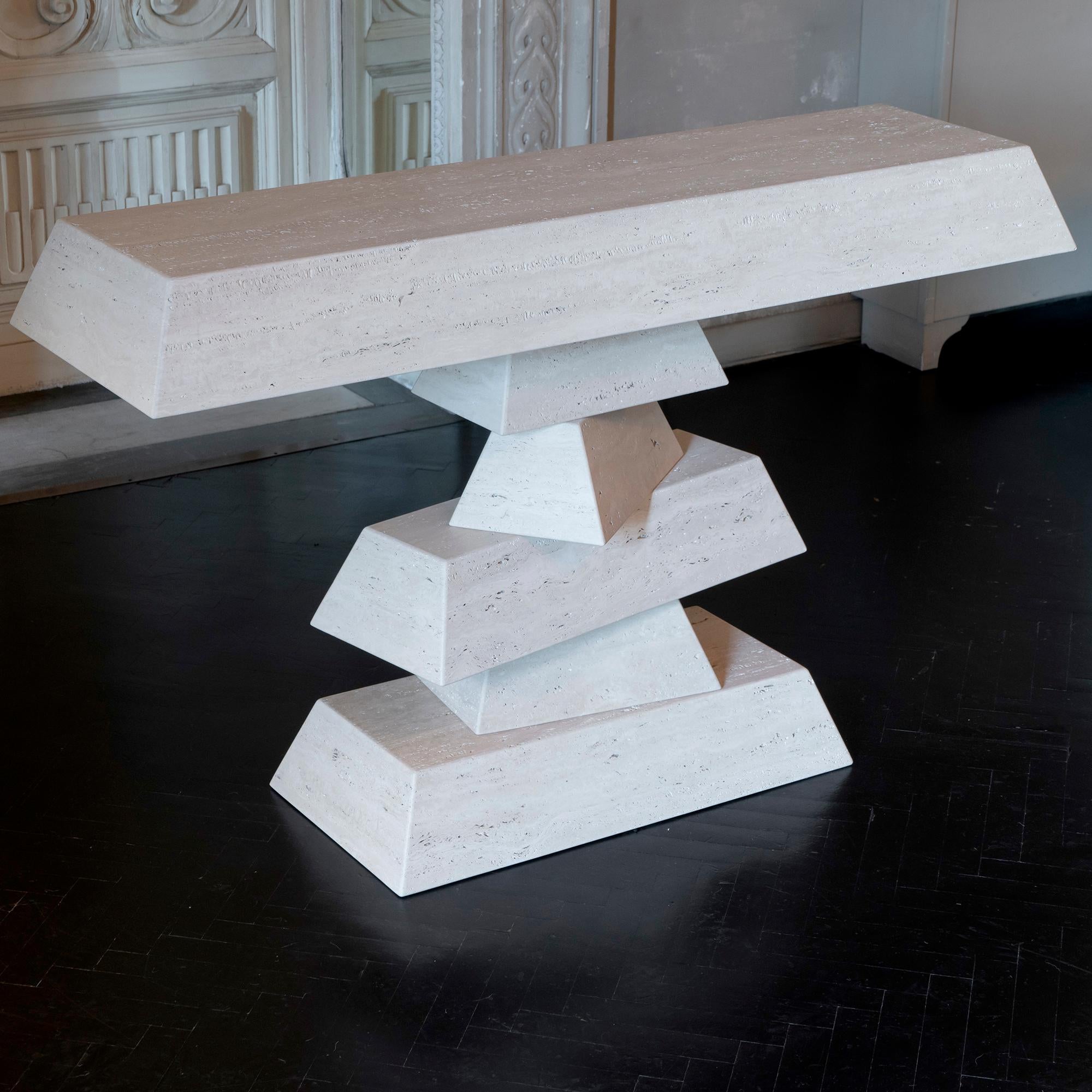 Part of the Flair Edition collection, made to order console realized in beveled travertine blocks, the six elements that create the console are separate and inserted one on the other as shown in the images.
  