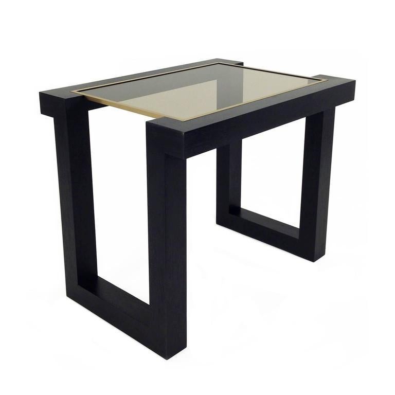 Flair home collection custom black ash veneer on solid ash wood cut-out leg side table with brass inlay and bronze glass. The Flair Metropolis collection is produced in New York. Each piece is handmade by a master woodworker using the finest