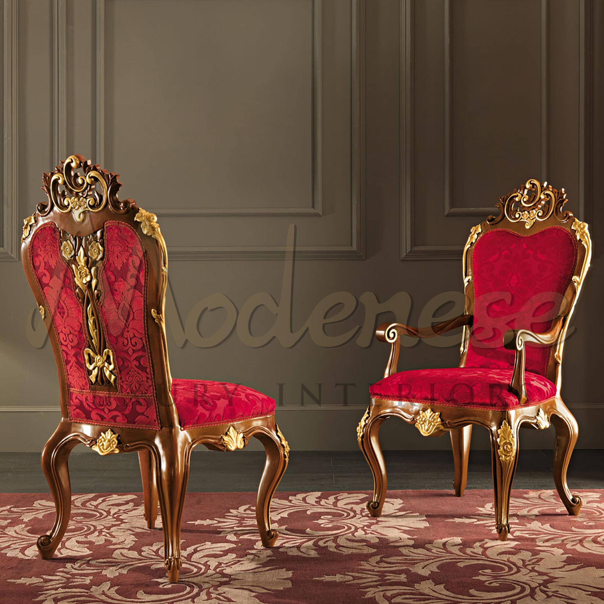 Specially designed chair with armrests by Modenese Luxury Interiors take on a true baroque style. This wonderful chair is a great head turner piece in any living space with its flamboyant red damascus upholstery being highlighted by the solid walnut