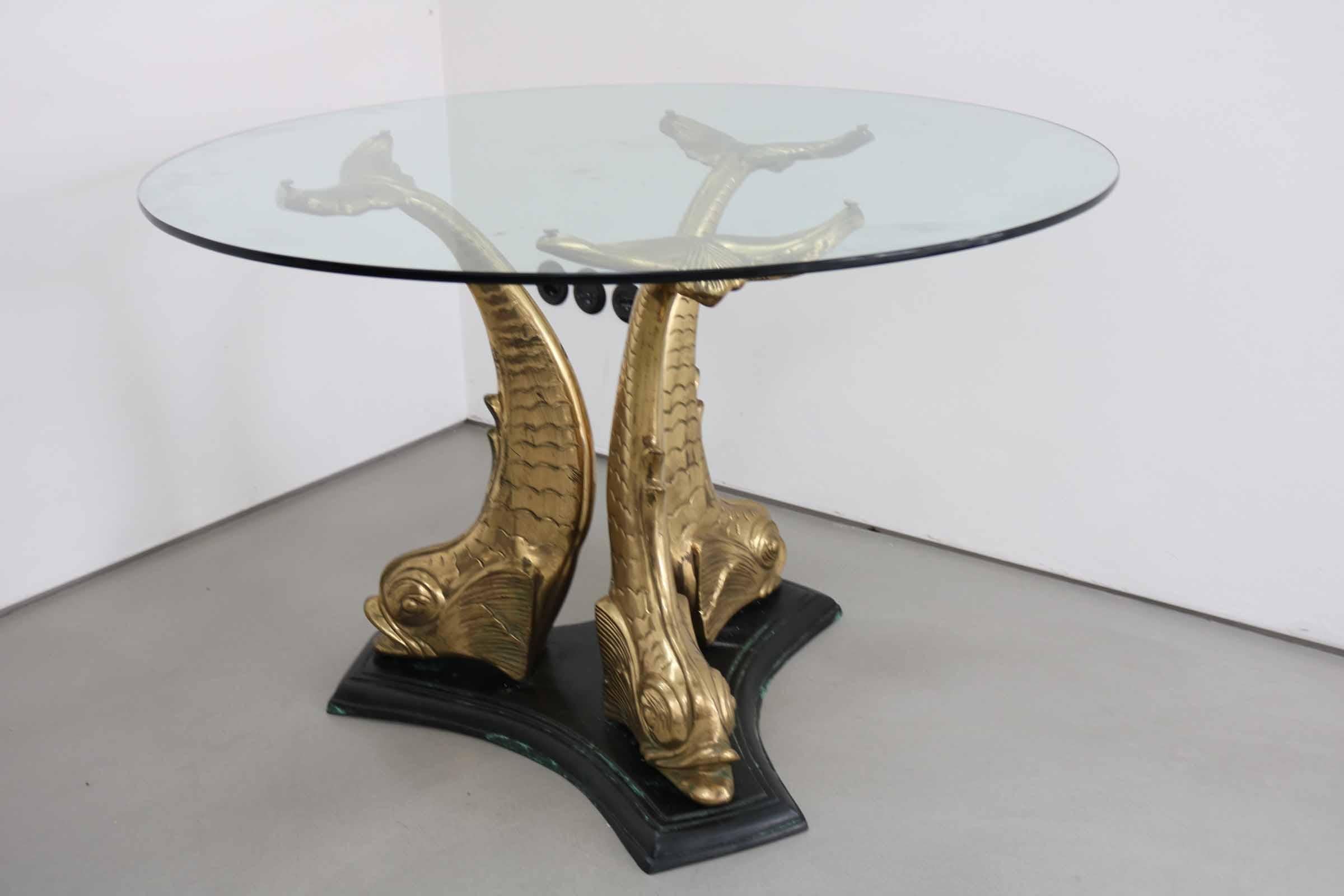 Hollywood Regency style brass and glass dining table, Italy 1960s. Good Vintage condition with light signs of use.
