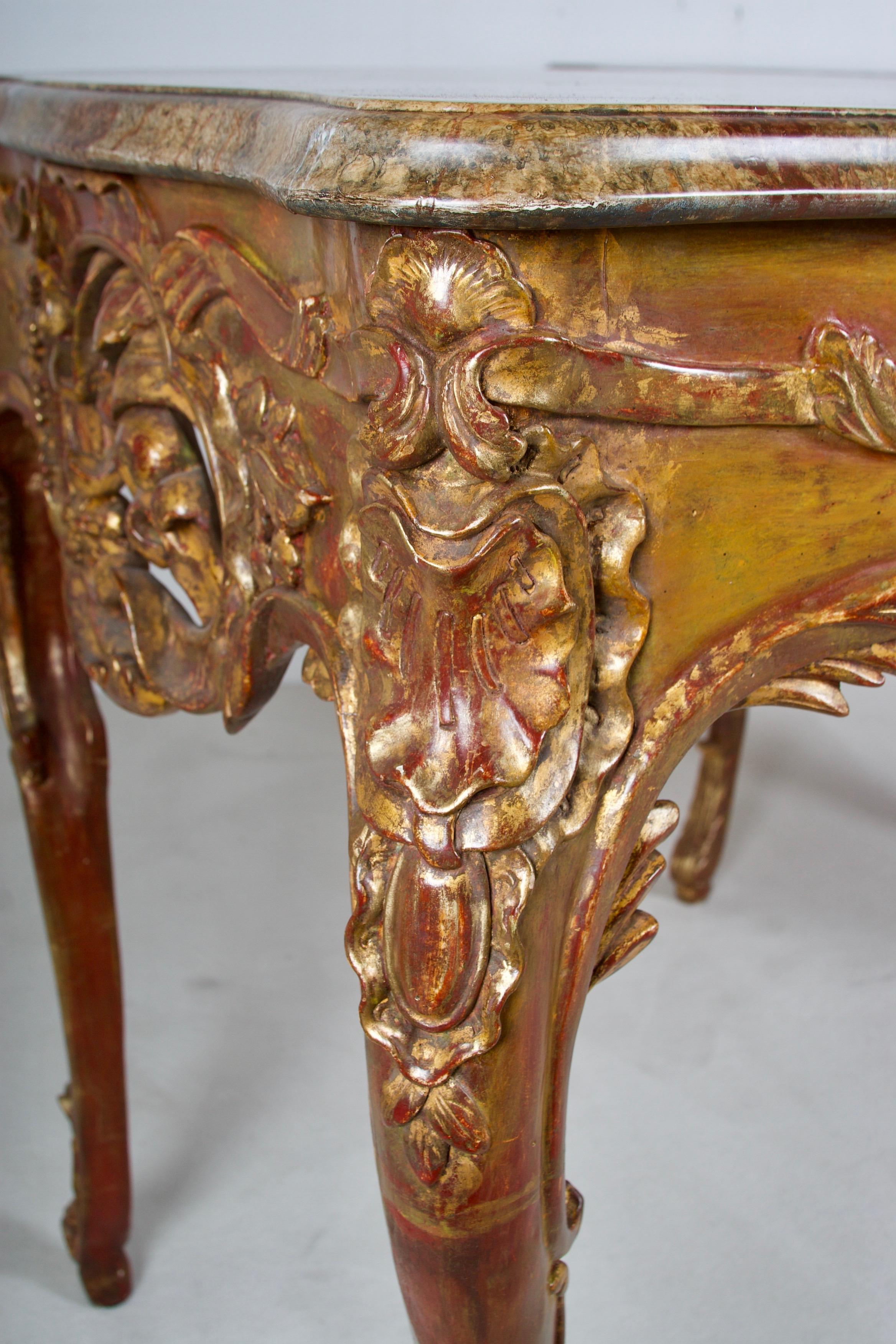 Hollywood Regency Flamboyant Pair of Painted and Gilded Consoles, Faux Marble Top, Haute Hollywood For Sale