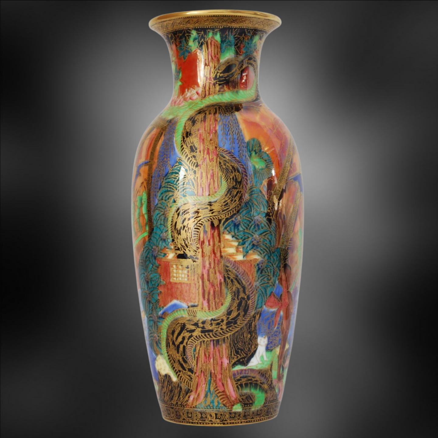 A tall, well-proportioned vase in Flame Fairyland Lustre, decorated with Tree Serpent pattern and Imps on a Bridge (pattern Z5360).

Exhibited: Wedgwood, Master Potter to the Universe, Roche Foundation, 2023.

Wedgwood's Flame Fairyland Lustre is a