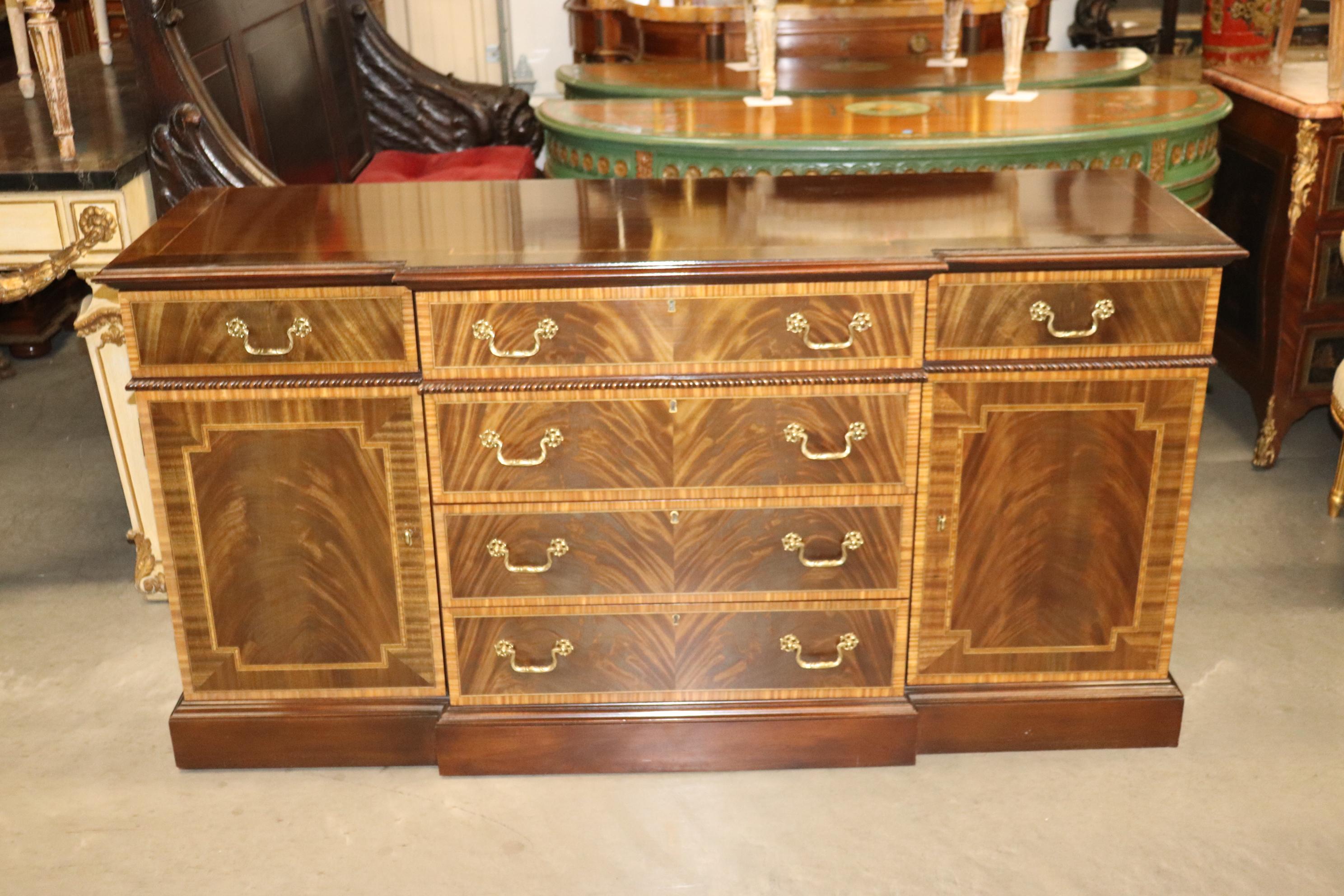 This is a beautiful flame mahogany Councill Craftsman sideboard. The sideboard is in good vintage condition.