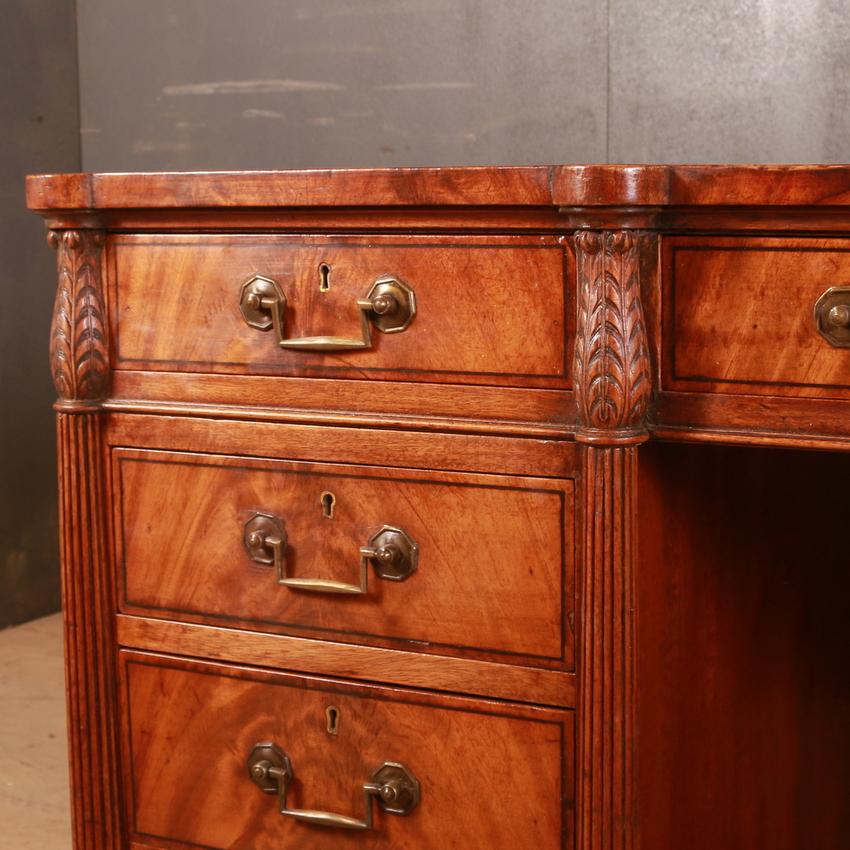 Large 19th century flame mahogany desk with a leather insert, 1880
The knee hole is 25.5