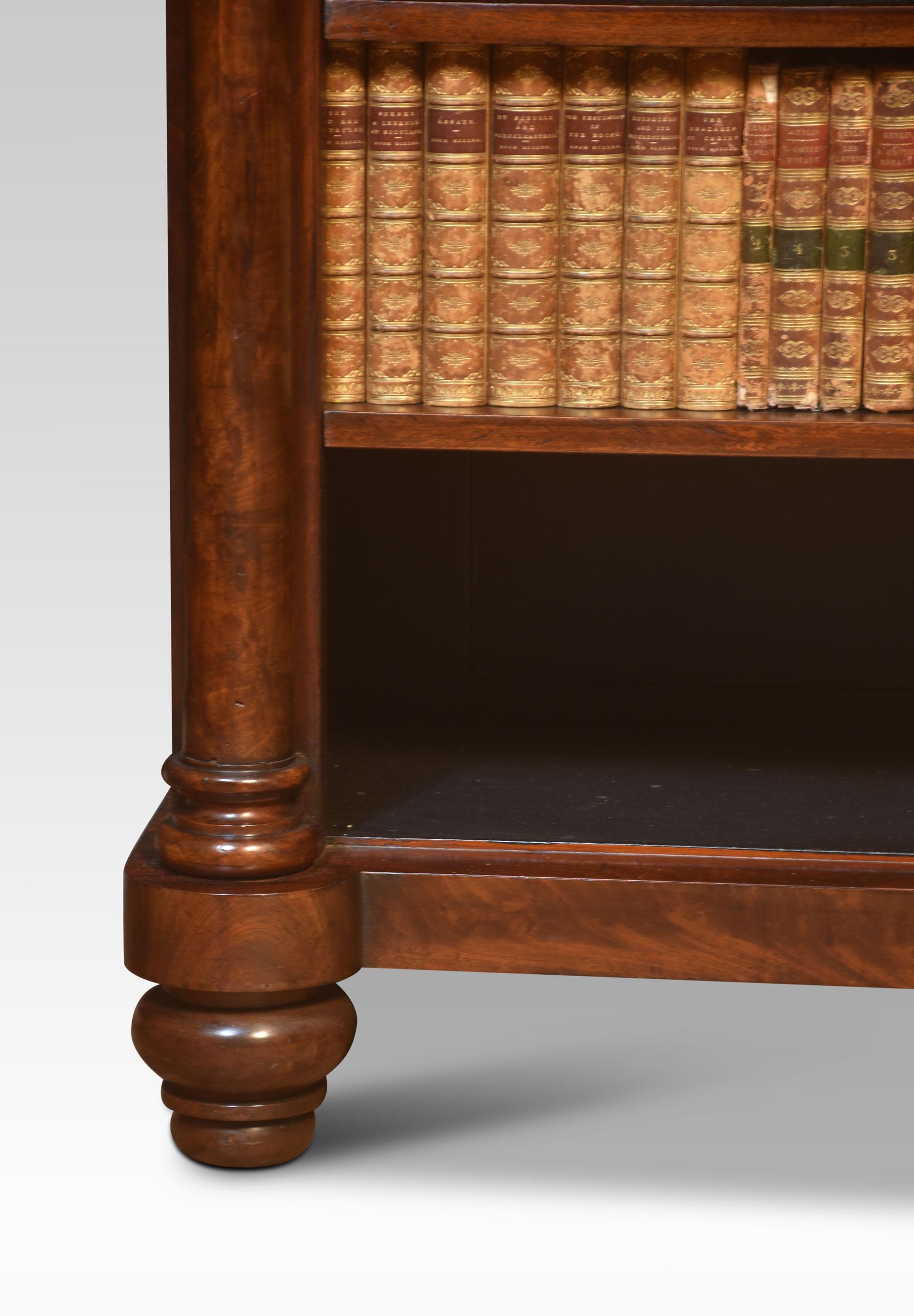 19th-century mahogany open bookcase, the rectangular top above aljustable shelved interior flanked by circular colums. All raised up on turned feet.
Dimensions
Height 37 Inches
Width 50 Inches
Depth 18 Inches.
