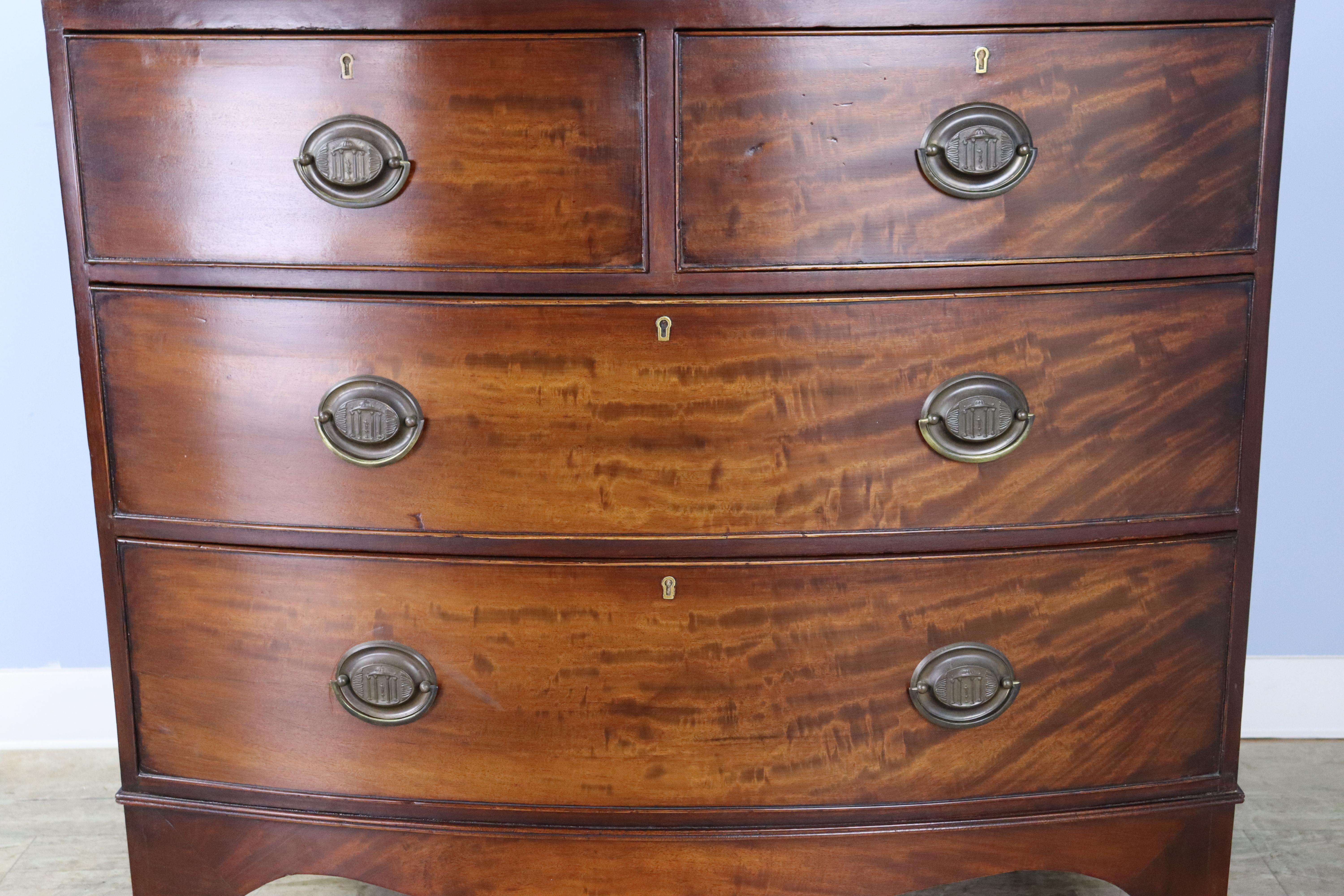 19th Century Flame Mahogany Regency Bowfront Chest of Drawers with Splayed Feet For Sale
