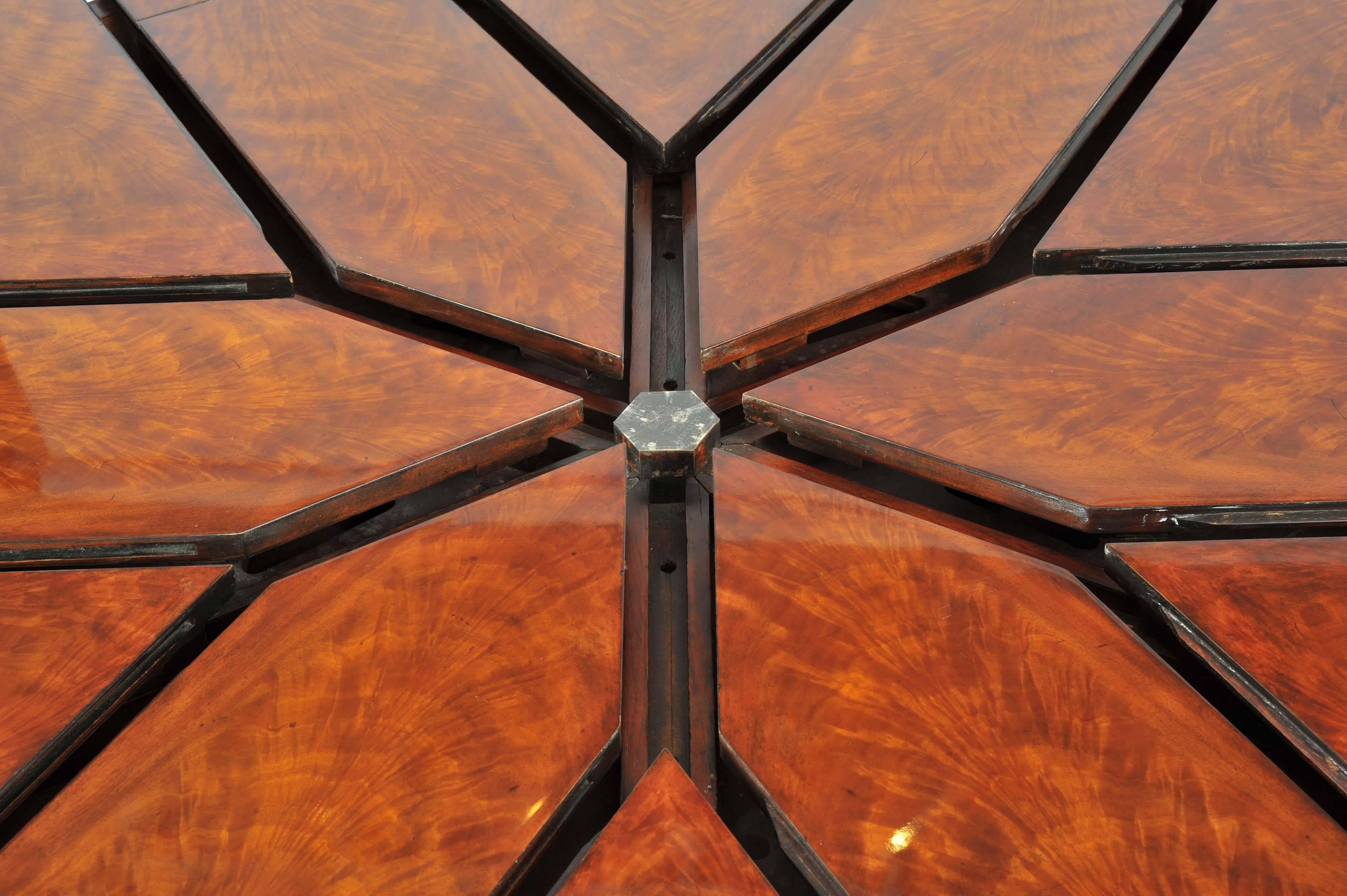 Contemporary Flame Mahogany Segmented Circular Extending Table