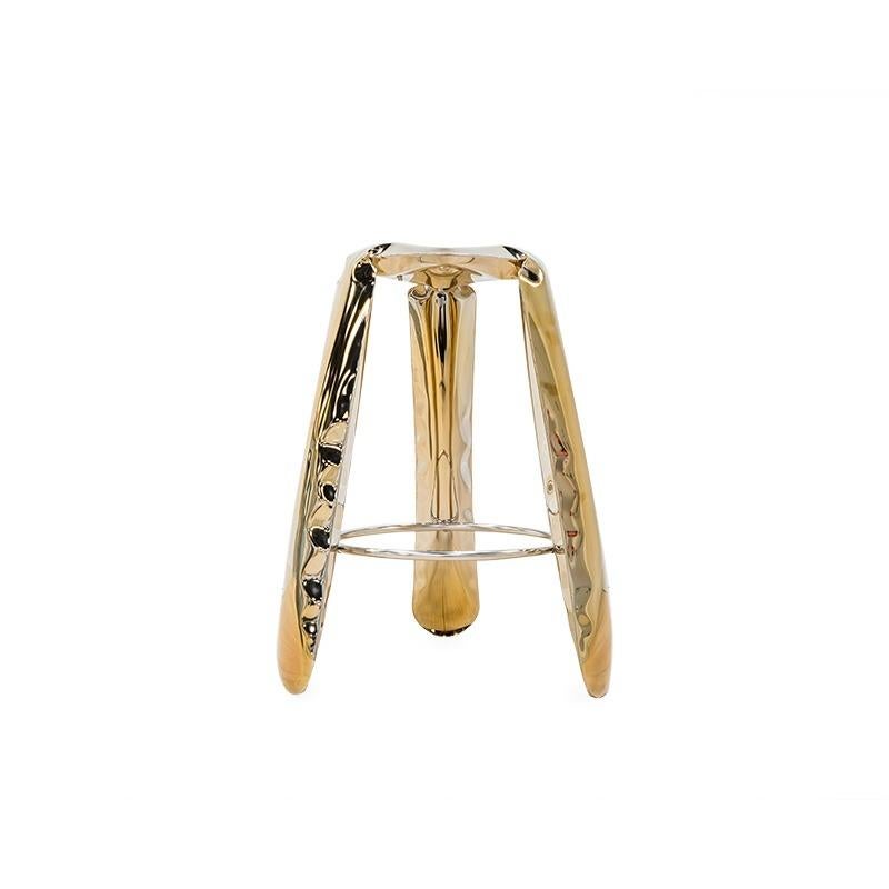 Flamed gold steel bar plopp stool by Zieta
Dimensions: D 35 x H 75 cm 
Material: Stainless steel, carbon steel. 
Finish: Thermal colored.
Available in colors: Beige, black, white, blue, graphite, moss, umbra gray, flaming gold, and cosmic blue.