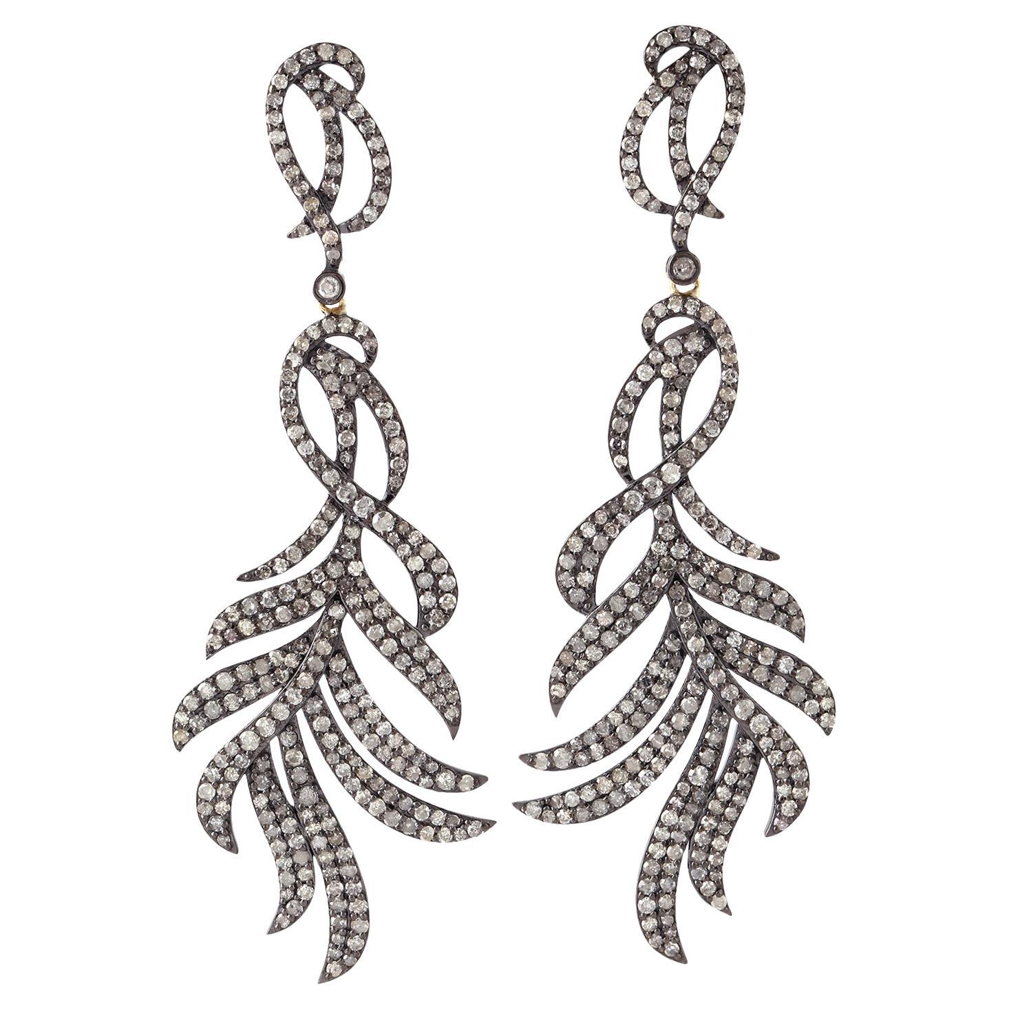 Orecchini lampadario in argento con pavé di diamanti