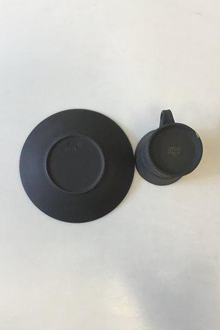 Flamestone, Quistgaard Danish design tea cup and saucer. 

Measures cup: 8 cm / 3 5/32 in. Diameter. Saucer: 16.5 cm / 6 1/2 in.