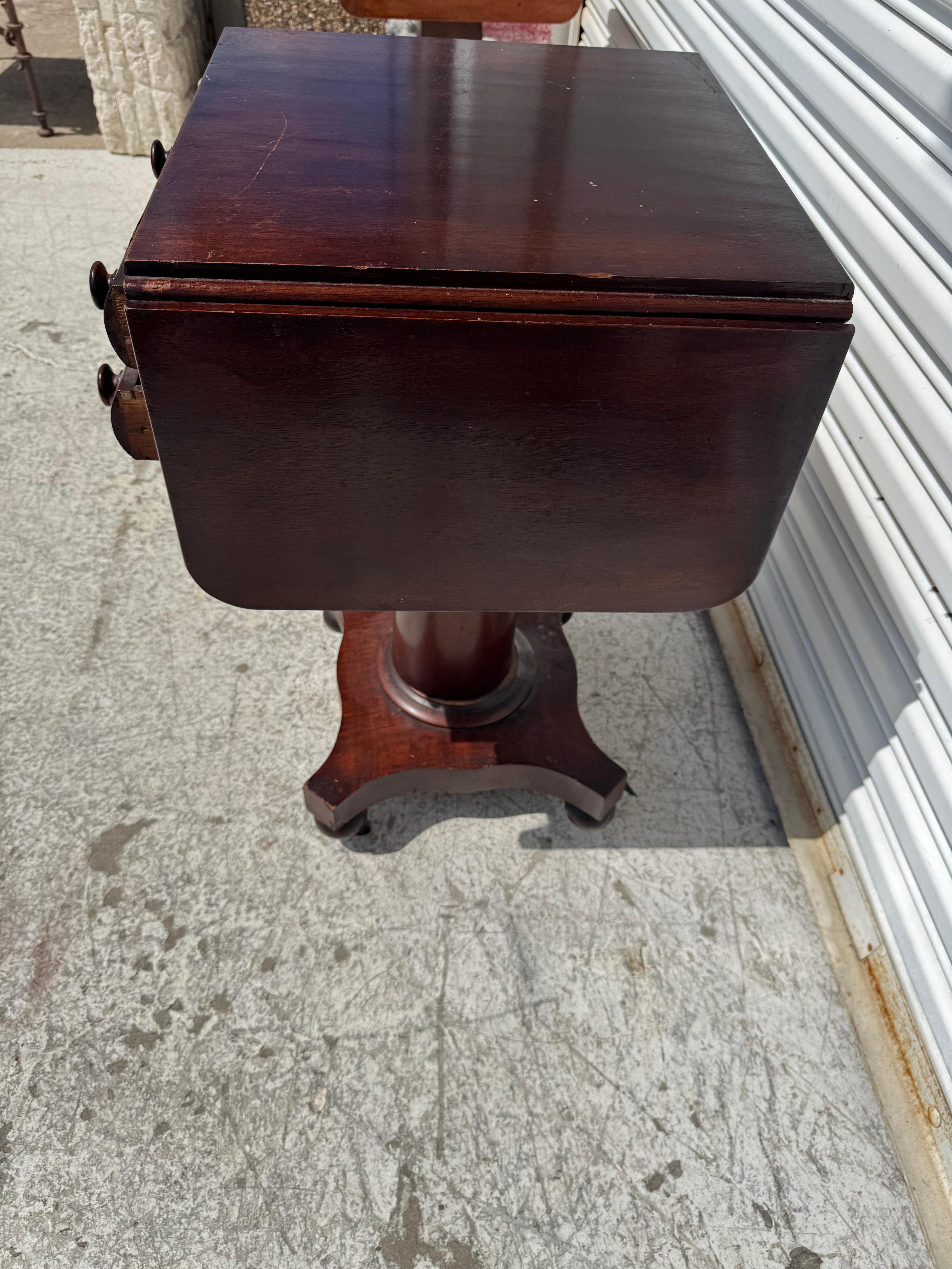 Flaming Mahogany Empire Revival Drop Leaf Sewing Table In Good Condition For Sale In Pasadena, TX