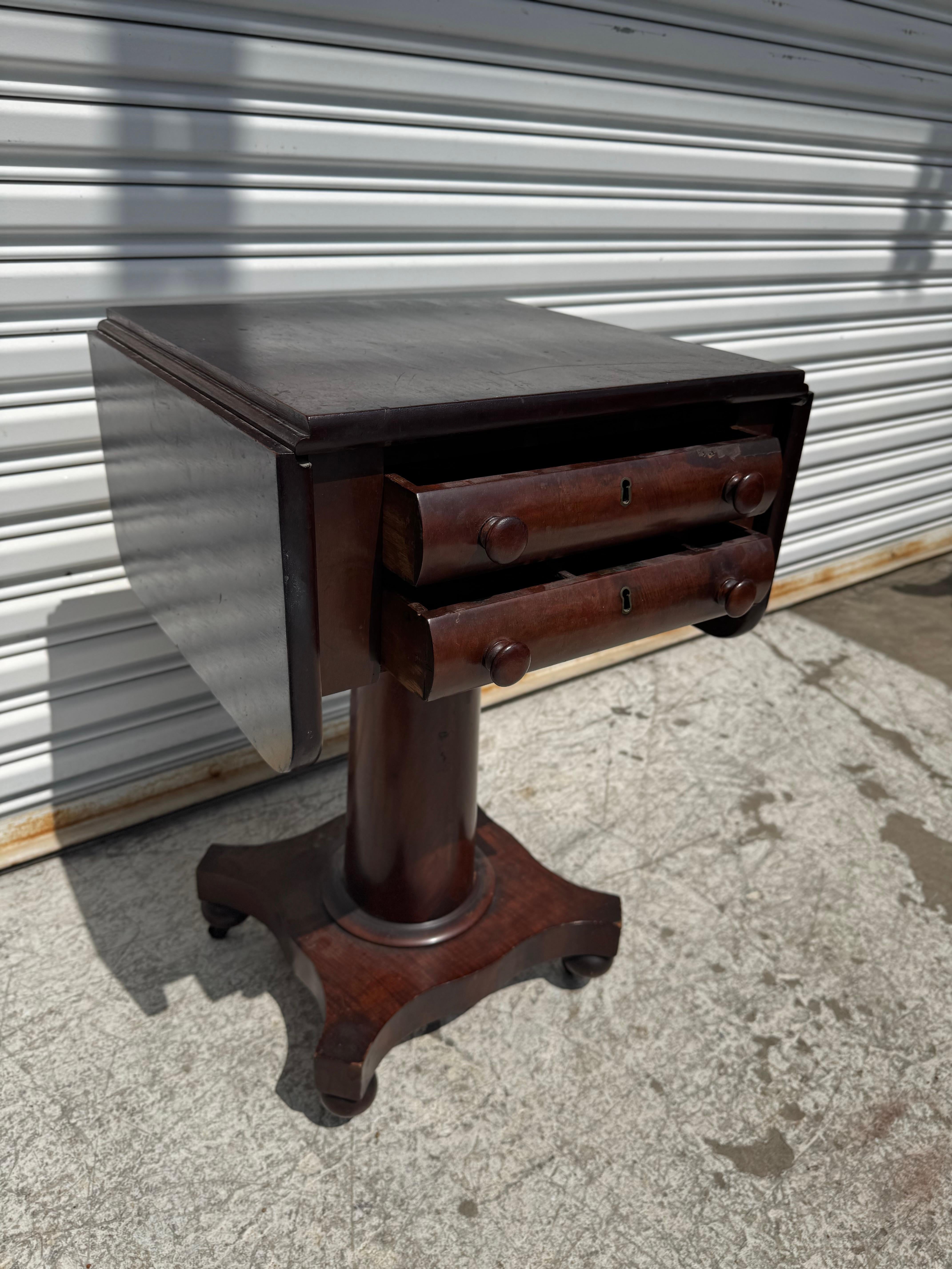 Flaming Mahogany Empire Revival Drop Leaf Sewing Table For Sale 1