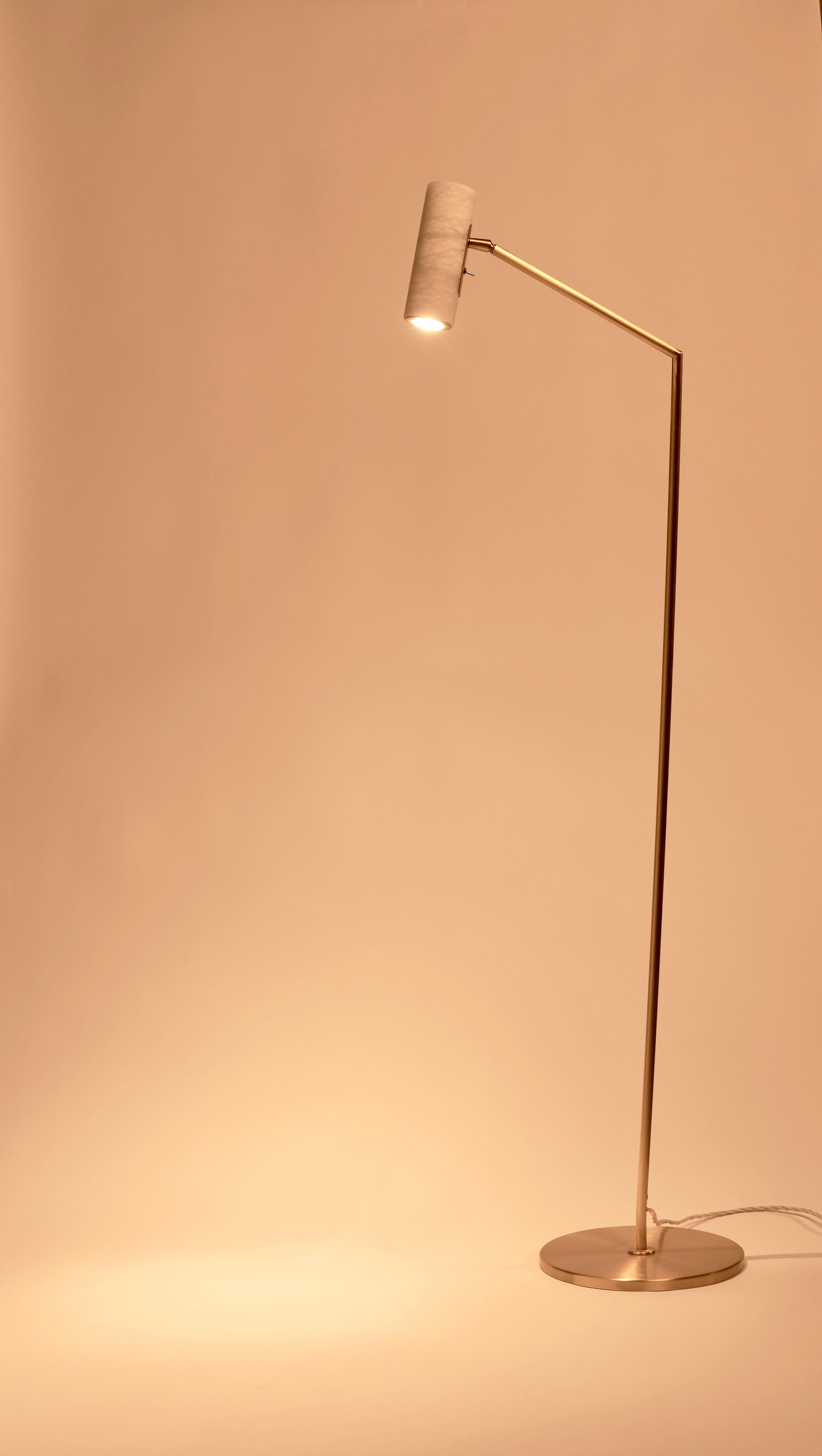 The Flamingo floor lamp is a handcrafted piece by Italian artisans, made using high-quality materials such as brass for the main structure and alabaster for the shade. The combination of these materials gives the lamp a stylish and elegant look that