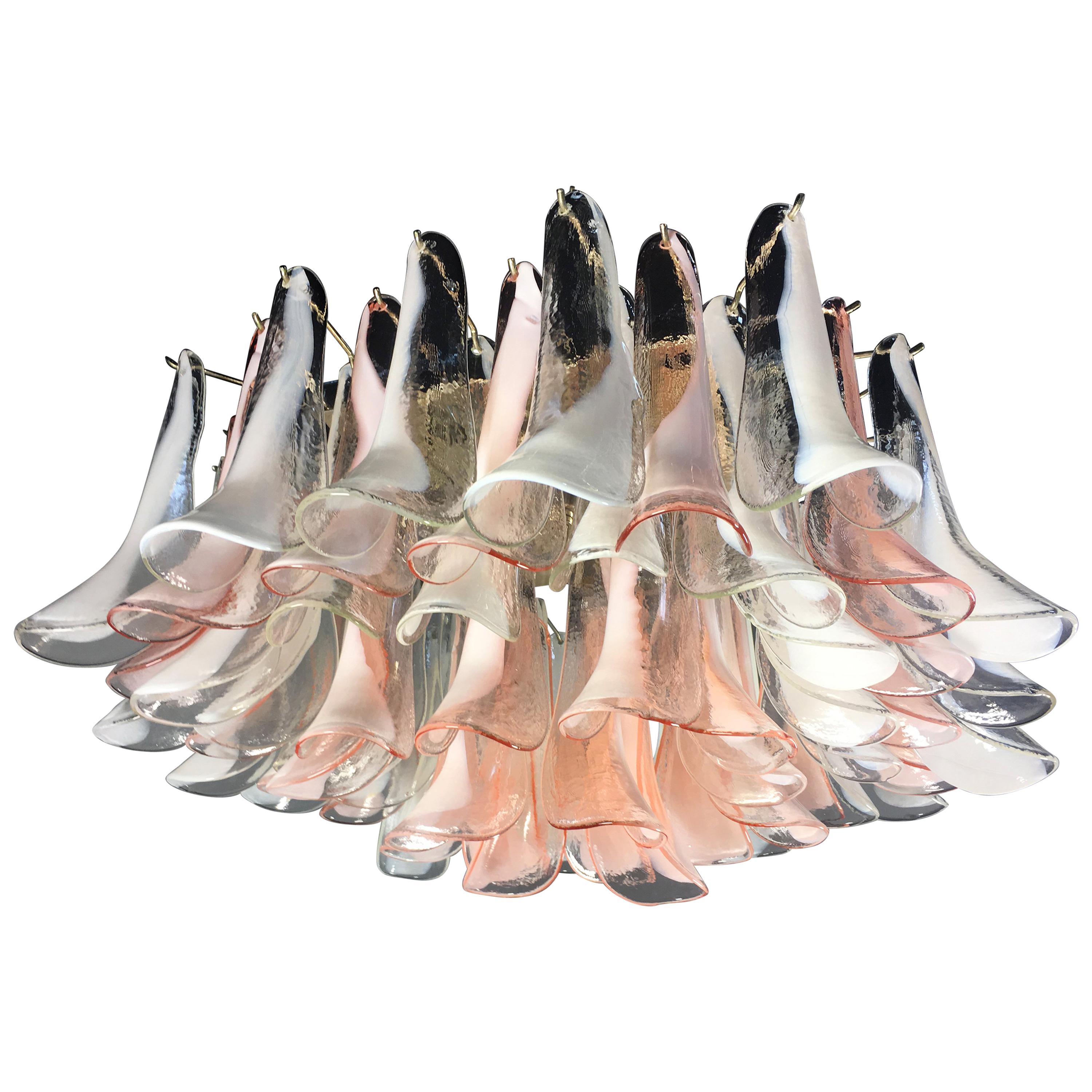 Spectacular ceiling lamp with 64 Murano Glasses. The glasses have two different colors, half are transparent with white spots, half are pink with white spots. Elegant lighting object.
Period: late xx century
Dimensions: 15,75 inches (40 cm) height;