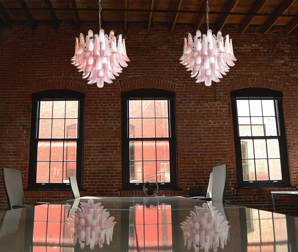 Italian vintage Murano chandelier, Mazzega, 53 pink lattimo glass petals
Murano Italian glass chandelier. Fantastic chandelier with pink and white “lattimo” glasses, nickel-plated metal frame. It has 53 big monumental petals glass. The glasses are