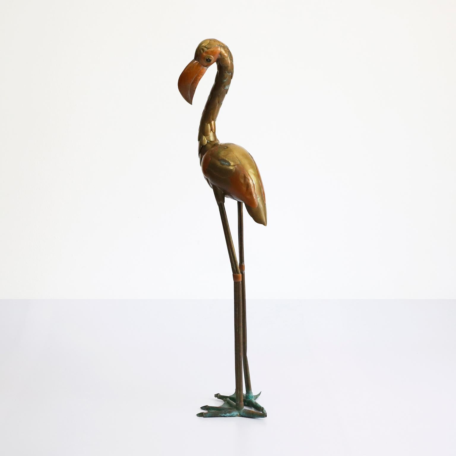 Copper, brass and aluminium Flamingo Sculpture by Sergio Bustamante, circa 1960.

Sergio Bustamante is a Mexican Artist and sculptor. He began with paintings and papier mache figures, inaugurating the first exhibit of his works at the Galeria