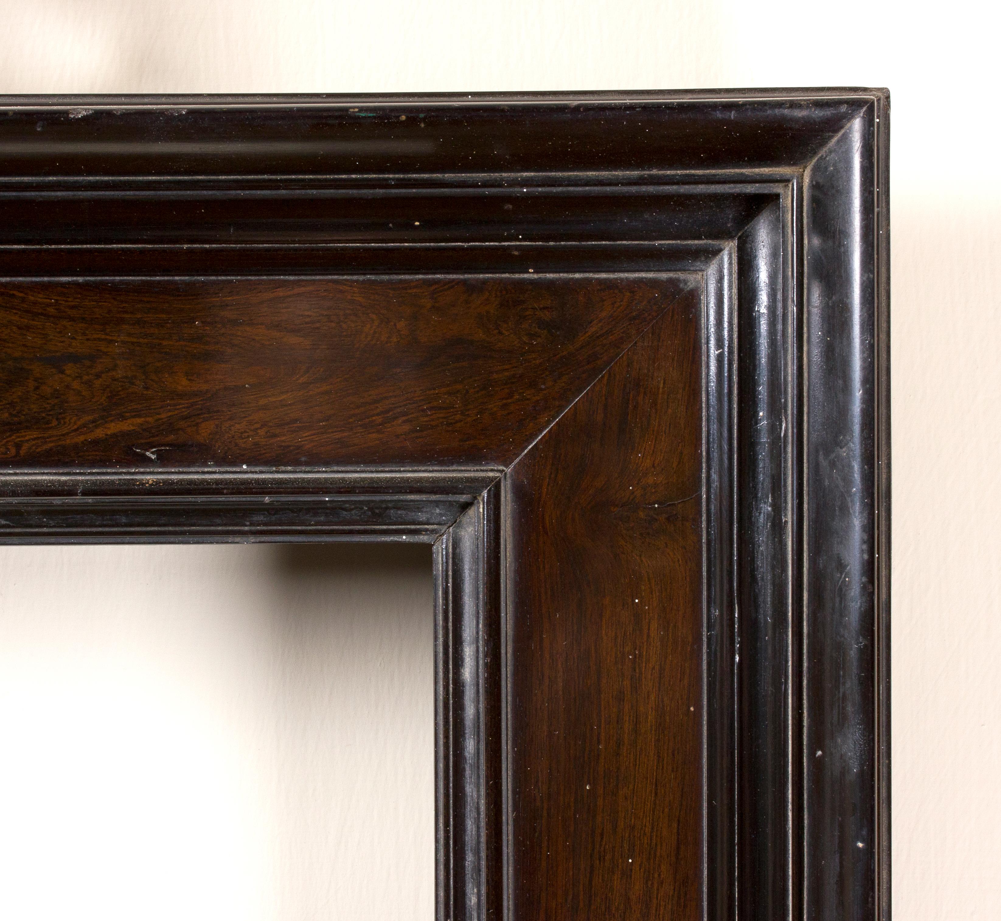 Flanders frame, late 16th-early 17th century
Ebony and rosewood carved frame, cassetta profile.
Measures: Inside: 29.3 x 24 cm; outside: 45 x 39 cm.
Depth is the wide of the band.
  