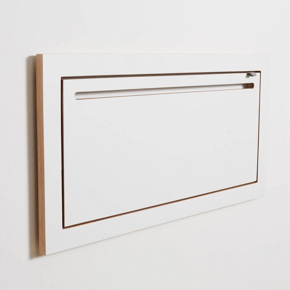 A combined shelf and clothes rail.

Although at first glance this would appear to be a standard Fläpps shelf, on closer inspection it doubles as a clever clothes rail. When folded, only one thin slot draws the attention to the hidden