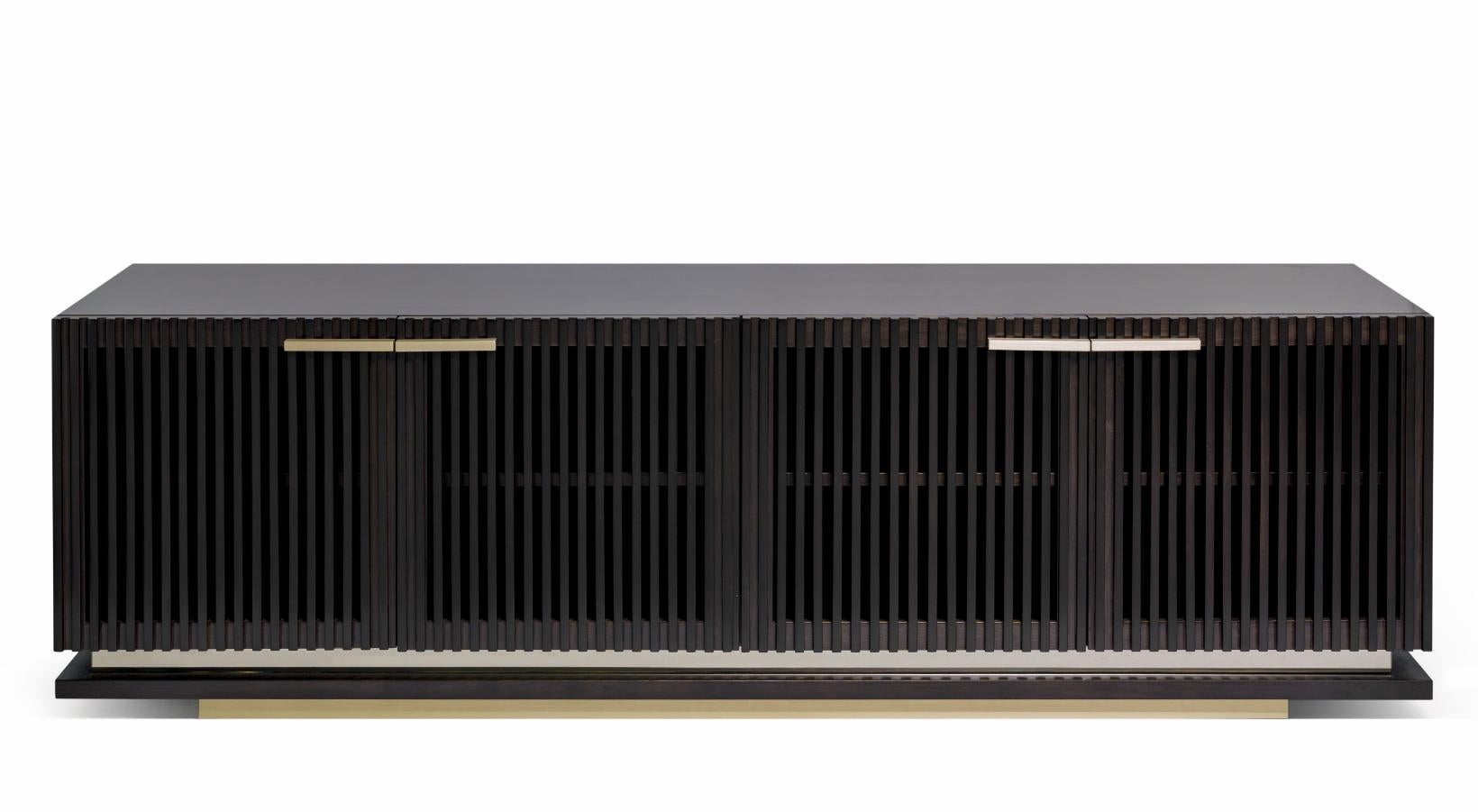 Flare TV Unit by DUISTT
Dimensions: W 200 x D 50 x H 61 cm
Materials: Darkened walnut, bronze mirror and Brass/Bronze, LED'S on the inside

The FLARE TV unit is here to cut the clutter and get things organized with style and elegance. This luxury
