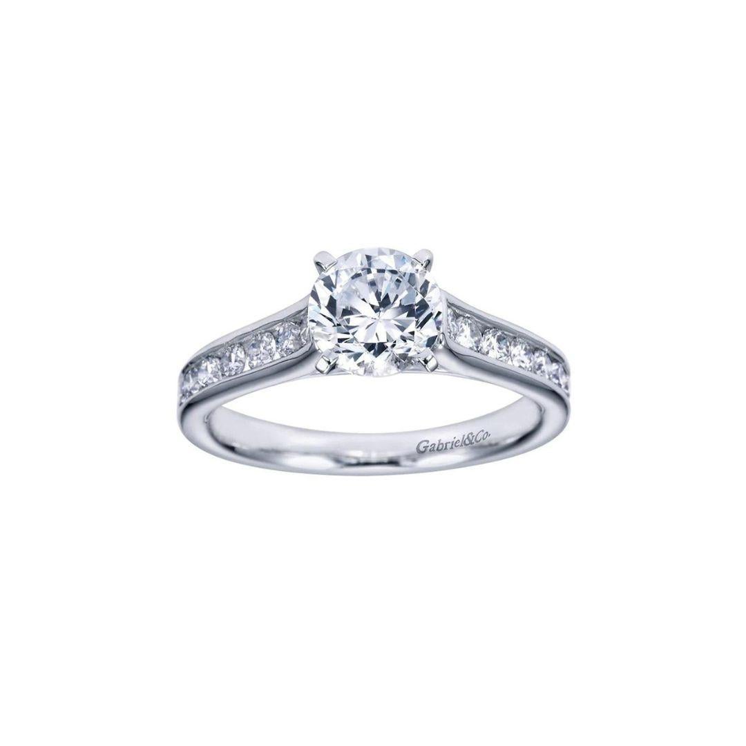 Flared Channels Fancy Solitaire Diamond Engagement Mounting in 14k White Gold﻿. Classic channel set diamonds flare up leading to the center stone, with a total carat weight of 0.33 ctw, H  color, SI1 clarity. Center diamond NOT included. Four prong