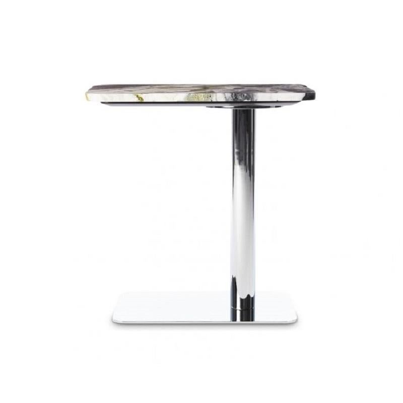 Tom Dixon's flash side tables come in three shapes- square, circular and rectangular. Each work equally well as singular statements as they do nested together in a three-tiered multi-level coffee table. Also available with black mirrored top and a