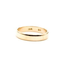 Anello a fascia piatta in oro giallo 18 carati