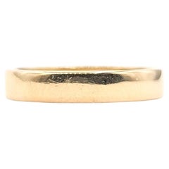 Anello a fascia piatta in oro giallo 18 carati