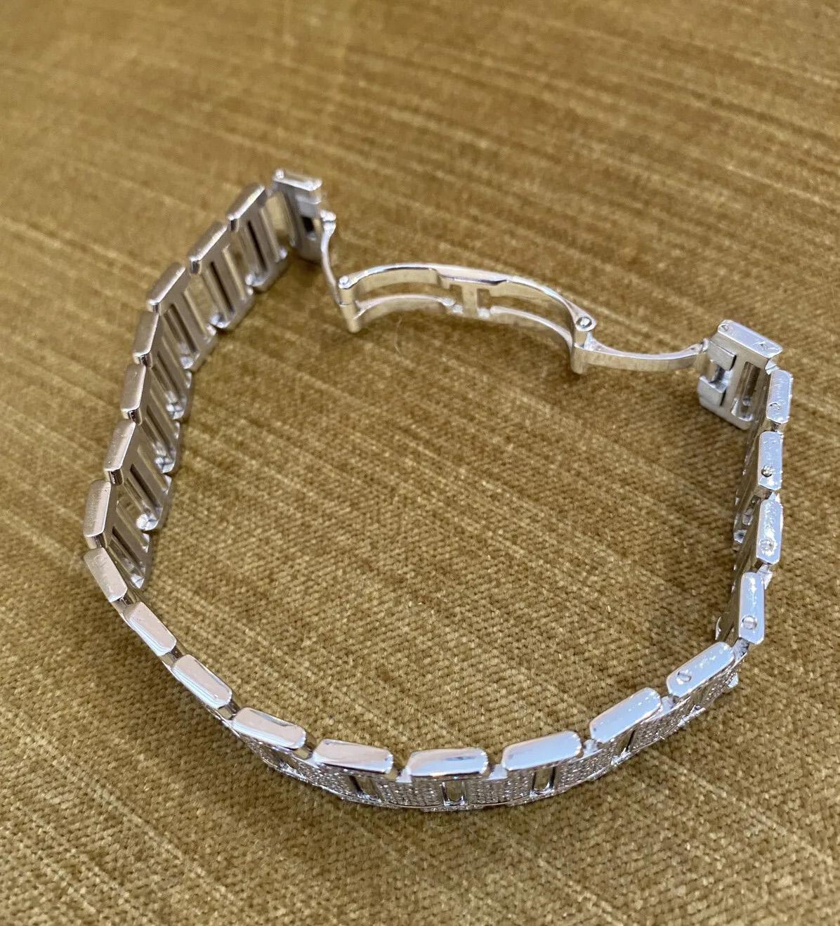 Flat Link Diamond Pave Bracelet 8.50 Carat Total Weight in 18k White Gold

Diamond Flat link Bracelet features Round Brilliant cut Diamonds Pave set in Flat square links in 18k White Gold. The bracelet is secured by a watch-style hidden double