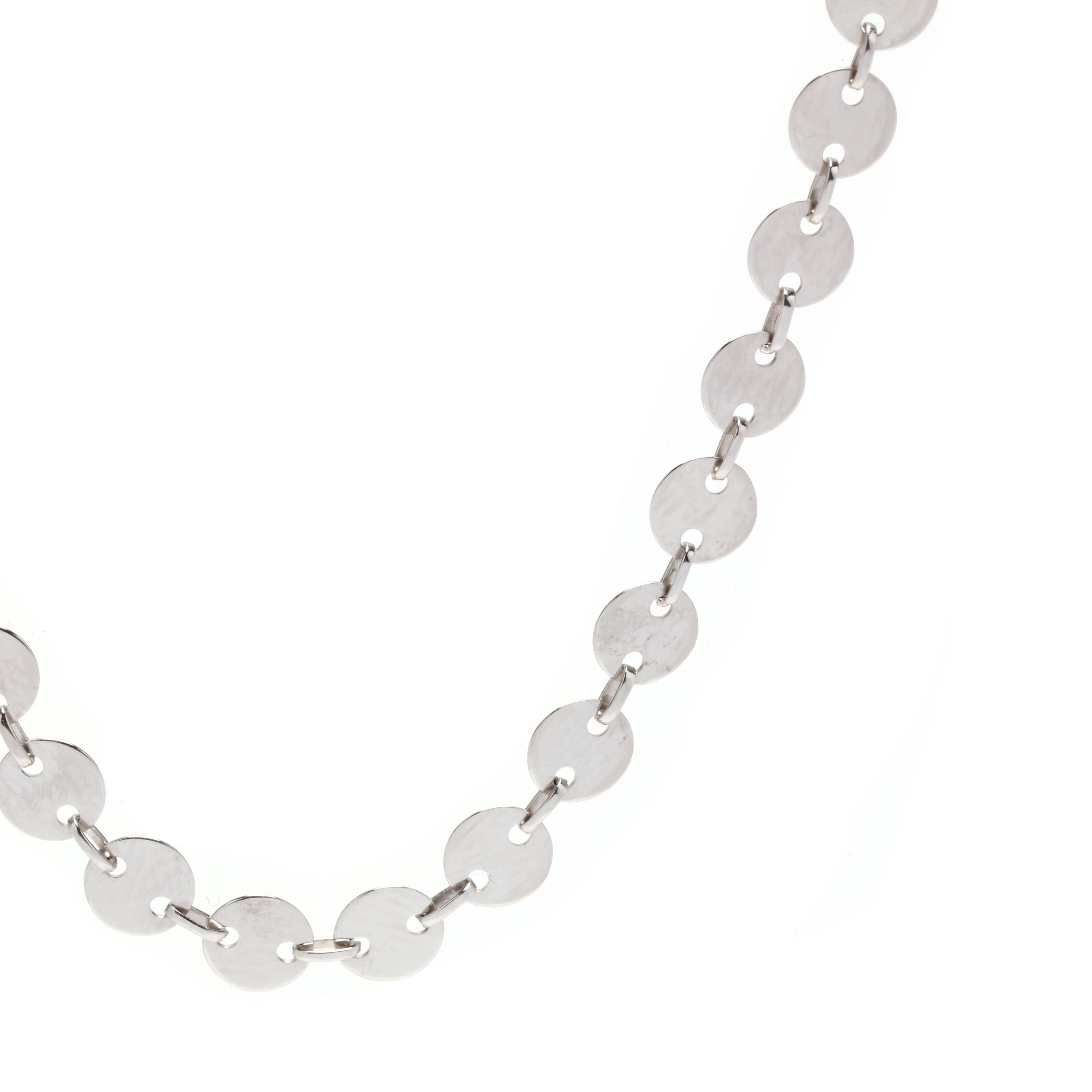 A 14 karat white gold flat round mirror link chain necklace. This adjustable fancy chain features alternating flat round mirror links with thin oval links and with a lobster clasp.

Length: 17.75 - 19.75 in. (adjustable)

Width: 5 mm

Weight: 3.6