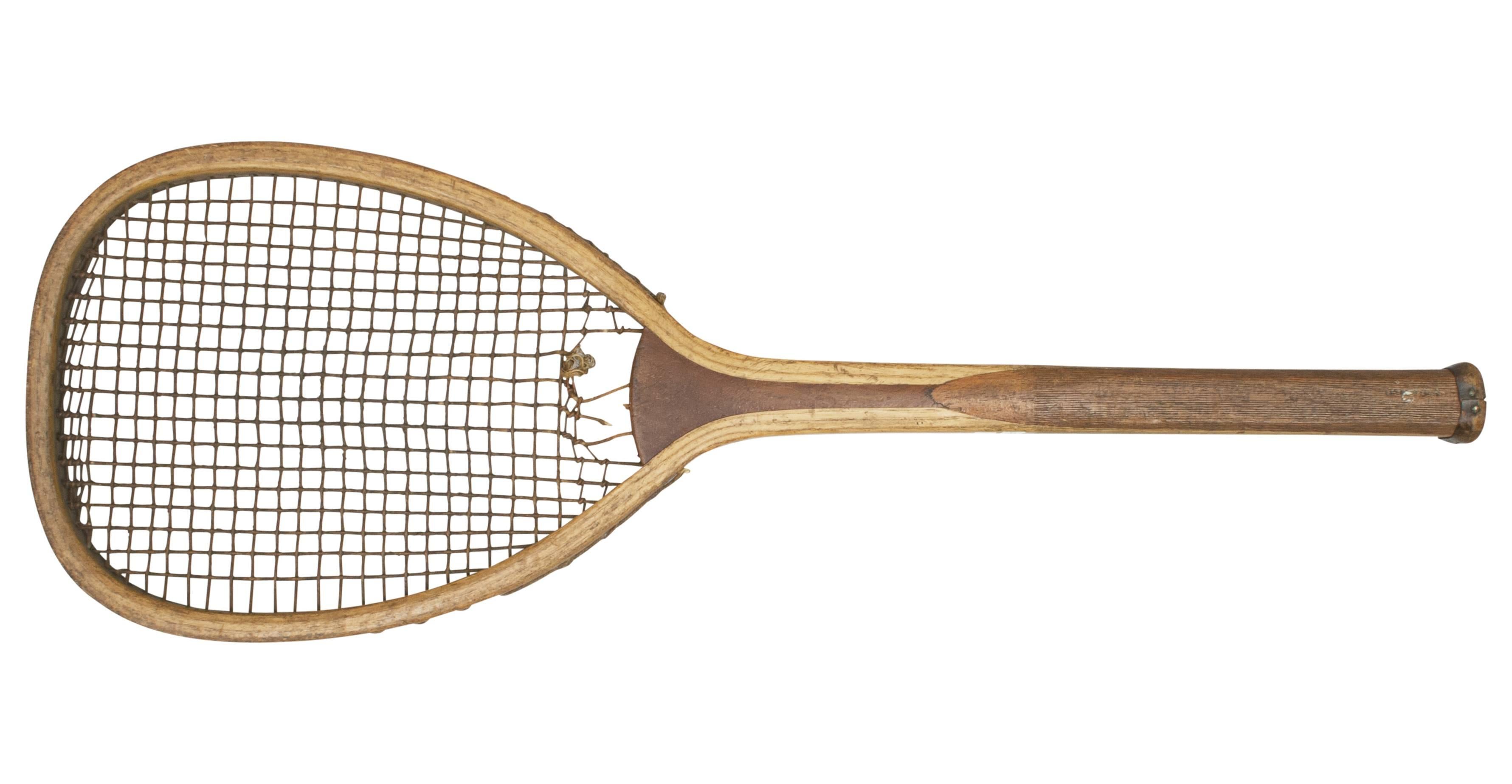F.H Ayres lawn tennis racket.
A fine example of a flat top lawn tennis racket by F.H. Ayres. The racket has an ash frame with faint Ayres name, convex walnut wedge and with original thick gut stringing. The stringing is slightly damaged but all