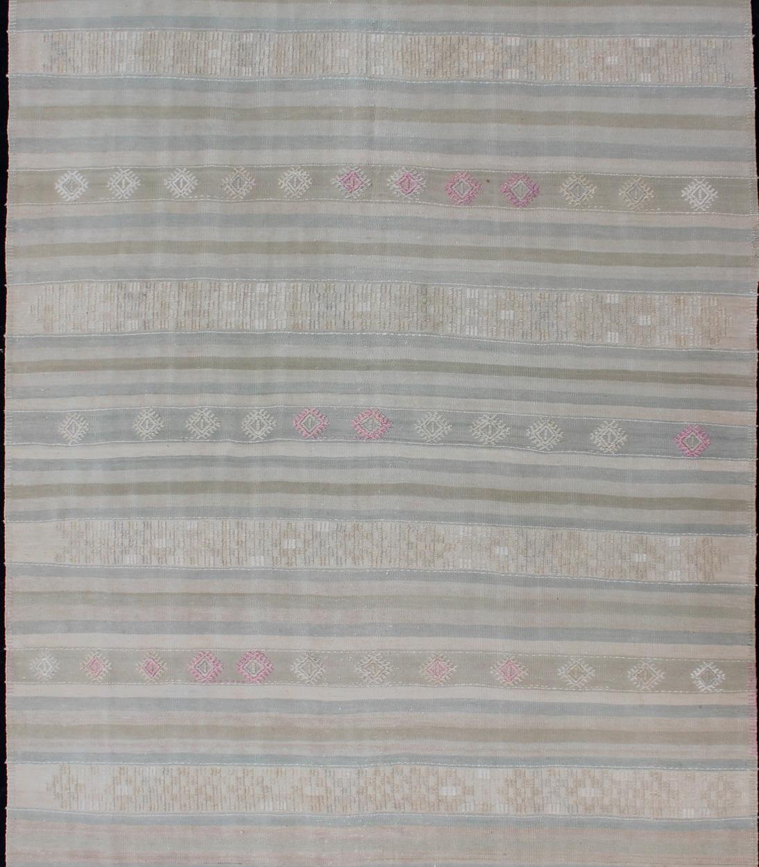 Vintage flat-weave Kilim with embroideries in blue and gray with a modern design
geometric stripe design Vintage Kilim from Turkey, Keivan Woven Arts / rug EN-179256, country of origin / type: Turkey / Kilim, circa 1960

This vintage Turkish