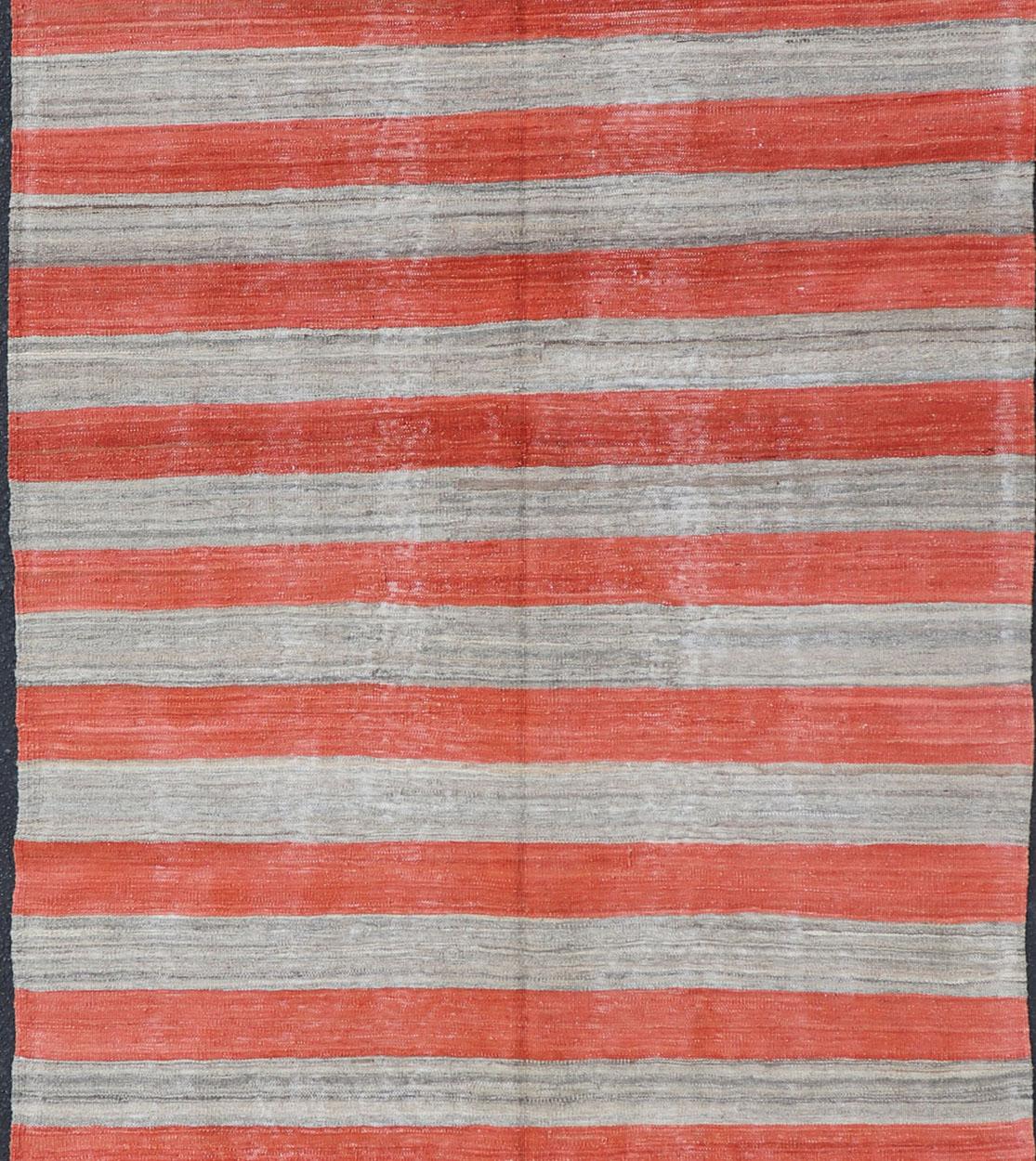 Wide runner flat weave Kilim runner with stripes with modern design in shades of gray and orange red, rug AFG-109, country of origin / type: Afghanistan / Kilim

Measures: 4'10 x 12'7 

This playful piece features a Classic stripe design that
