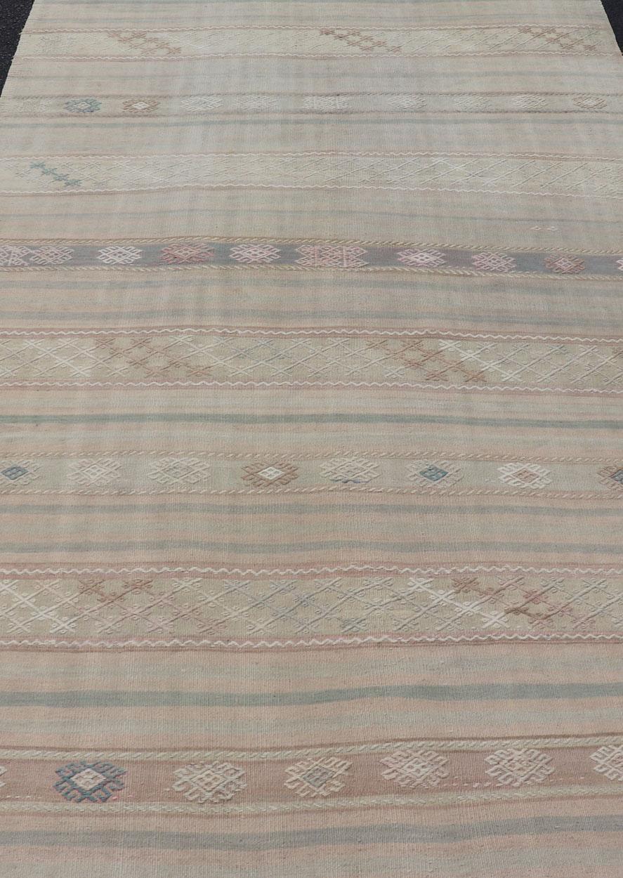 Flat-Weave Turkish Kilim with Embroideries in Earthy Tones and Hints of Pink For Sale 1