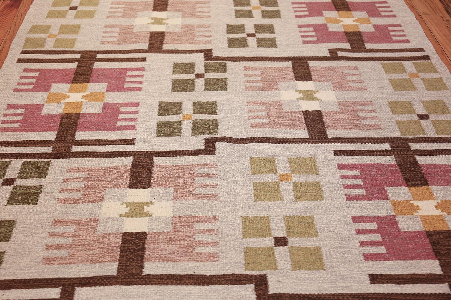 Vintage Geometric Scandinavian Flat Woven Kilim Rug by Ulla Brandt, Country of Origin / Rug Type: Scandinavia Rug, Circa date: Mid – 20th Century. Size: 5 ft 5 in x 8 ft 3 in (1.65 m x 2.51 m)

