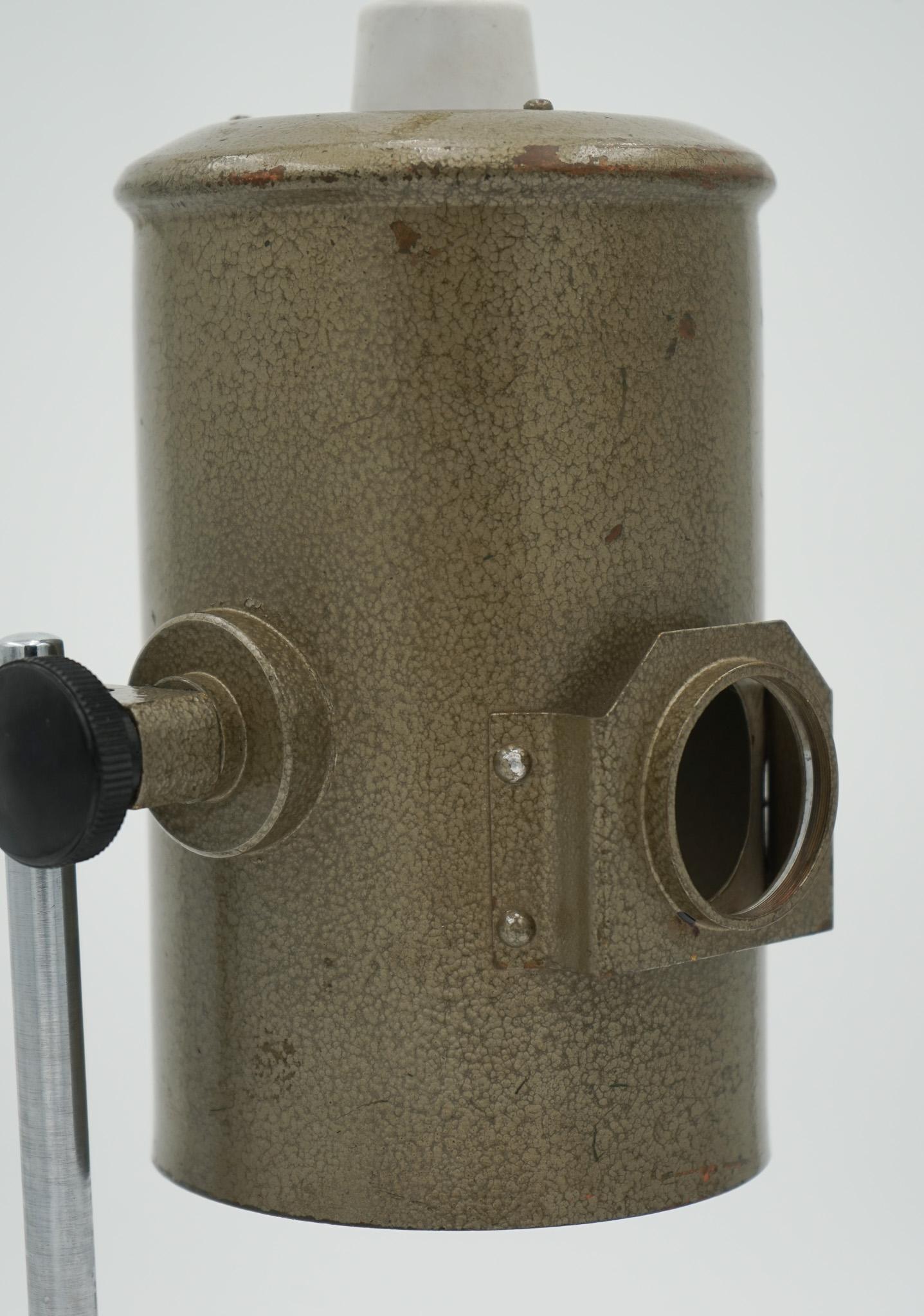 We are delighted to offer for sale this 1940s English Salvaged Laboratory School Lamp Is A Remarkable Piece.

 This lamp showcases the charm and industrial design of its era. The lamp features a natural patina that tells a story of its past, with