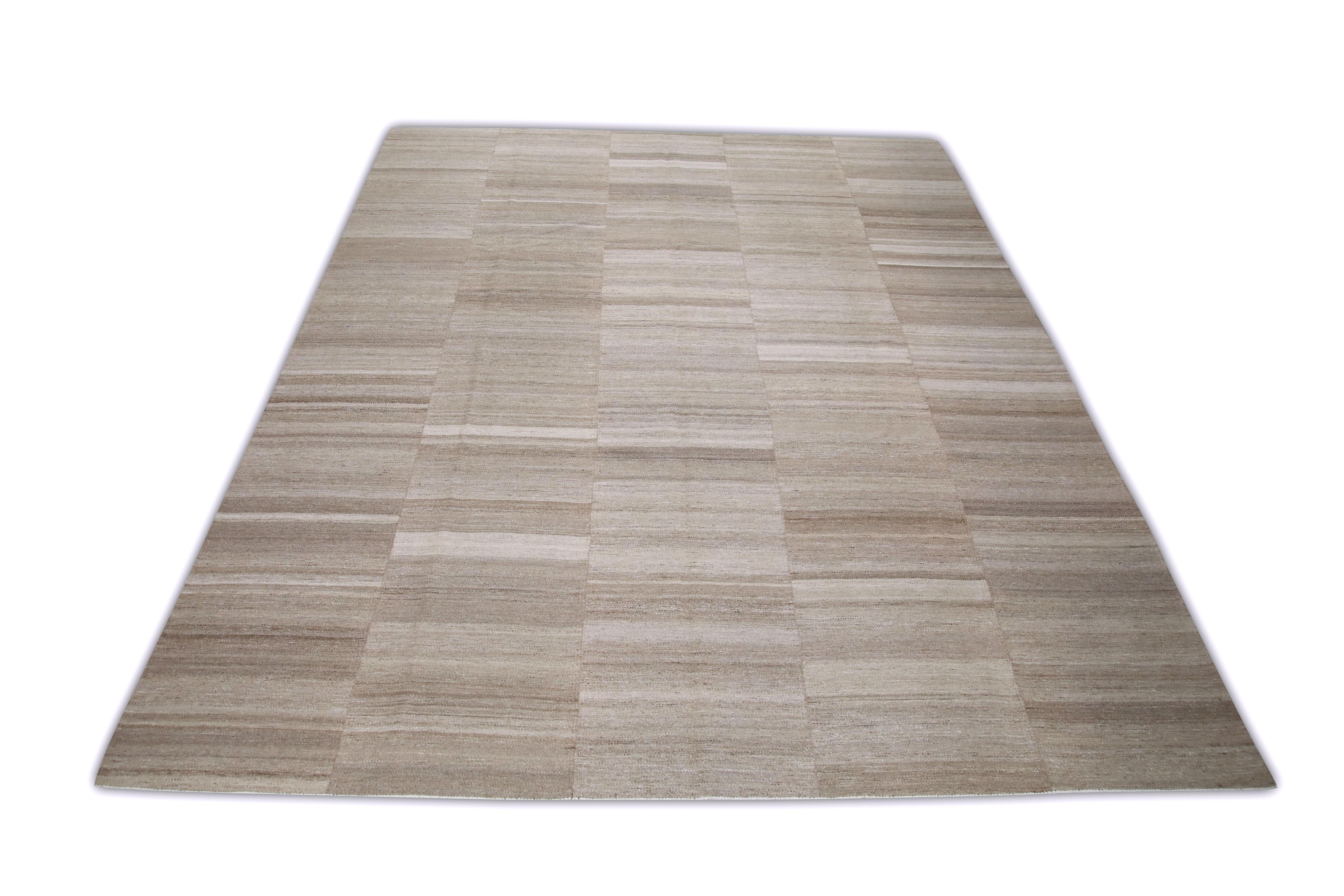 This exquisite Turkish flatweave kilim rug is a stunning masterpiece of traditional craftsmanship. Each rug is meticulously handwoven by skilled artisans using age-old techniques that have been passed down through generations. The intricate design
