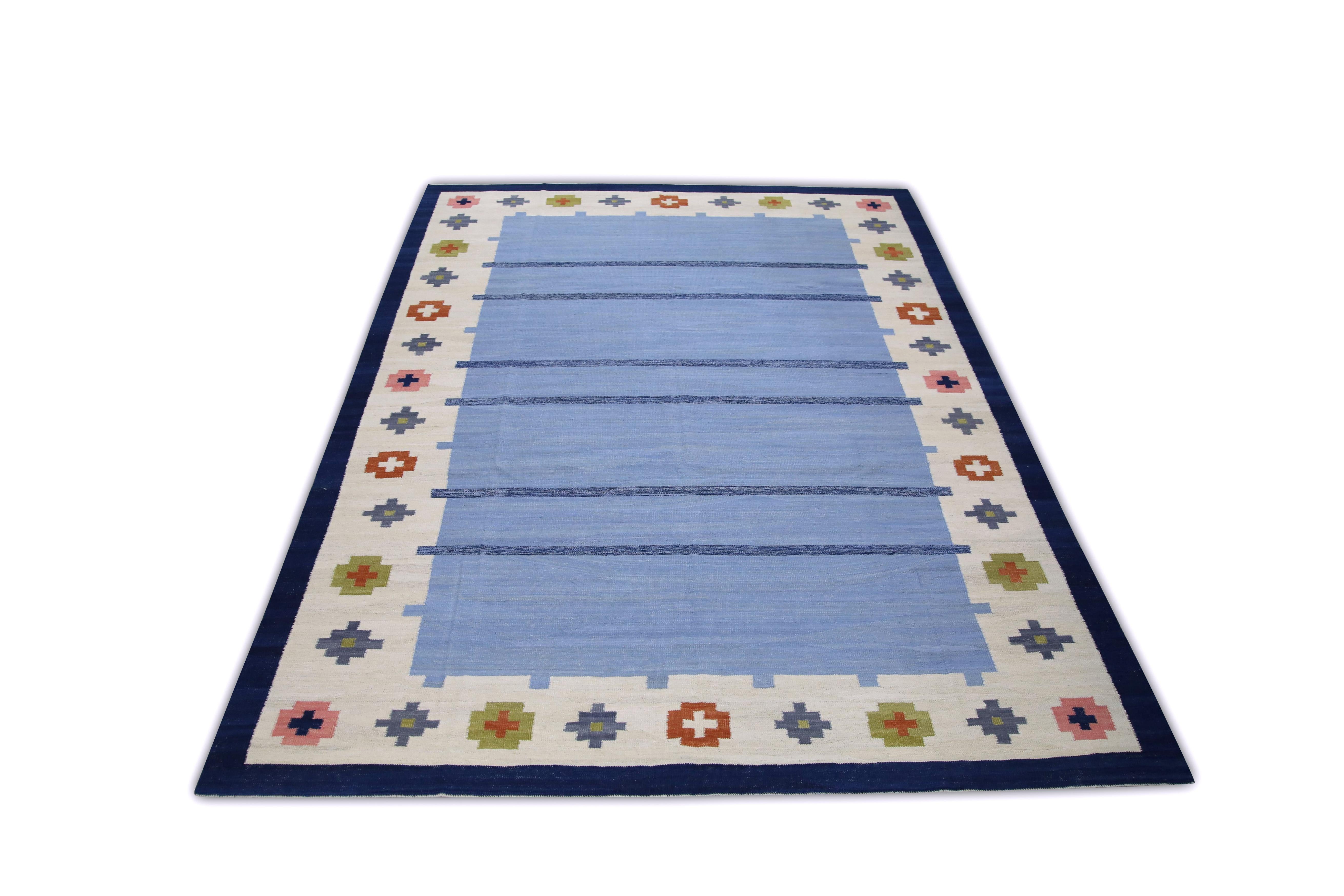 This exquisite Turkish flatweave kilim rug is a stunning masterpiece of traditional craftsmanship. Each rug is meticulously handwoven by skilled artisans using age-old techniques that have been passed down through generations. The intricate design