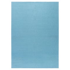Tapis moderne « Facet » en viscose bleue, à motif de losanges, tissage plat et format surdimensionné