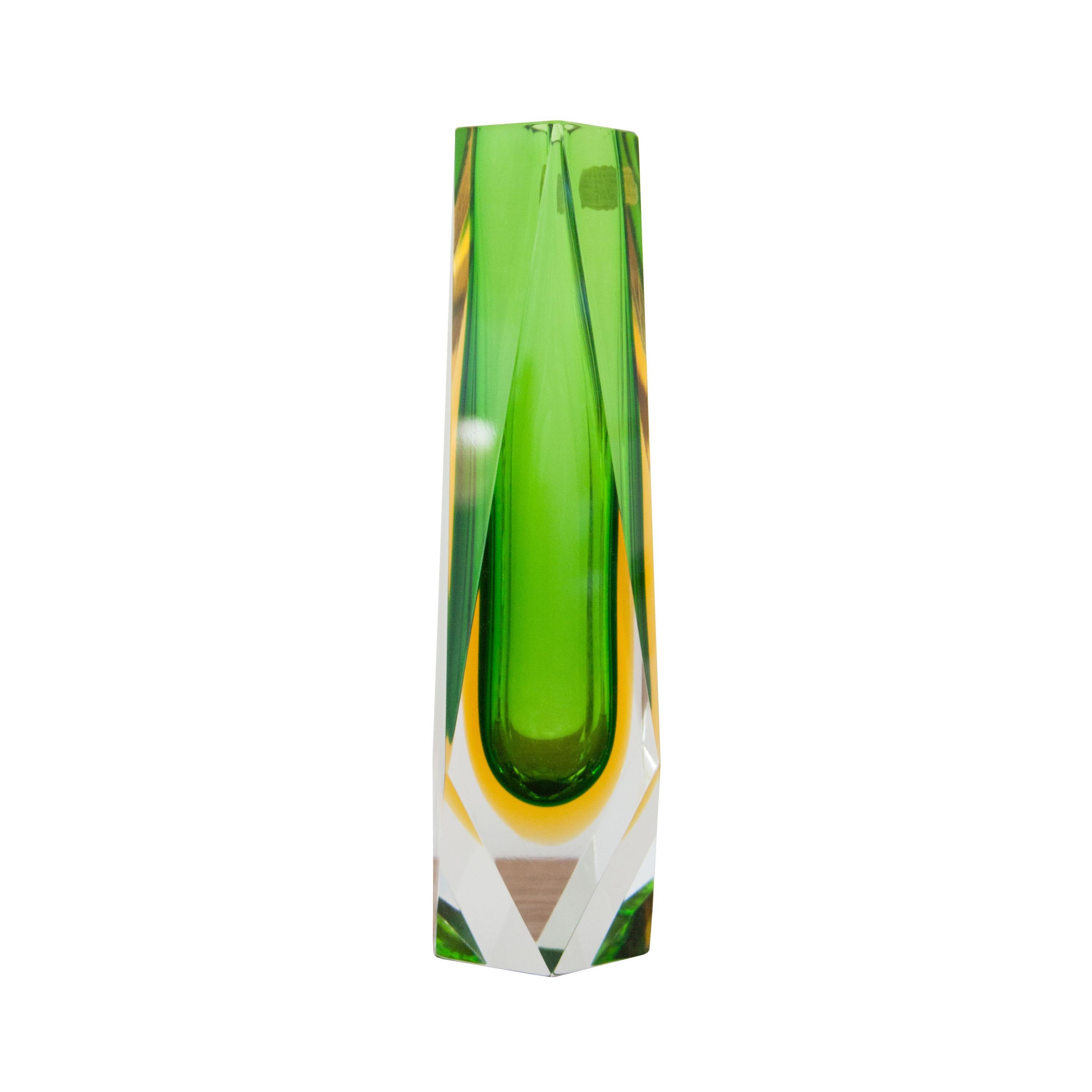 Italian vase designed by Flavio Poli and edited by Mandruzzato. Hand-crafted faceted Murano glass in green.