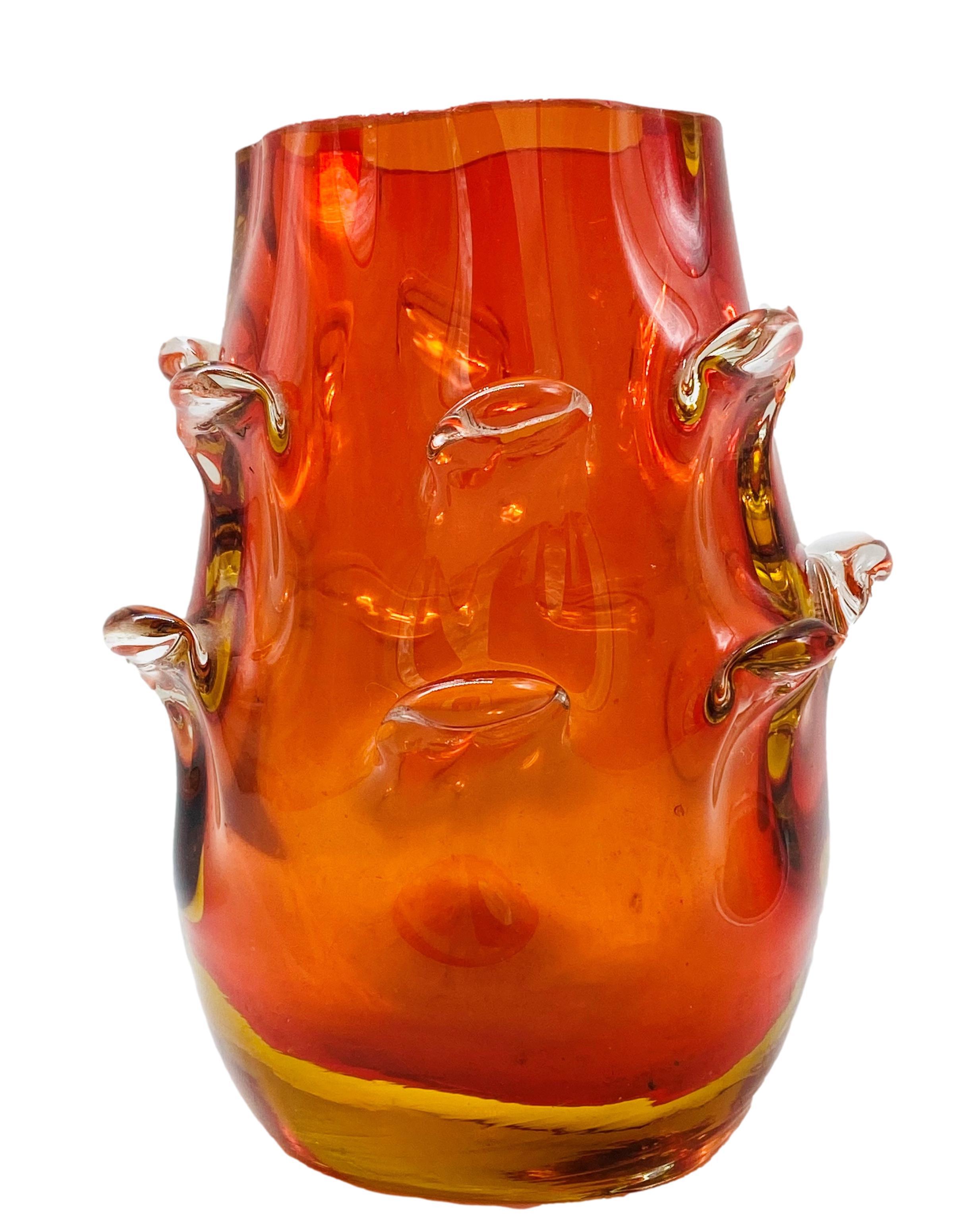 Submerged glass vase in orange with inclusions, Italy. 1960.