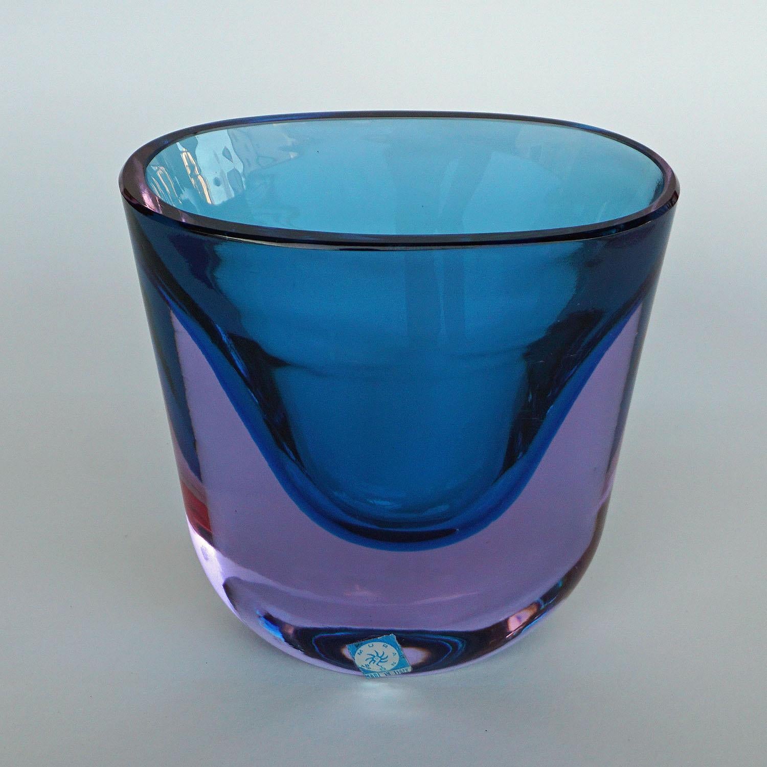 A nice venetian sommerso glass vase manufactured by seguso vetri d'arte and designed by flavio poli in the 1960s. thick blue and turquoise sommerso glass, polished rim. Generic rooster label on the body, possibly by the importer (Raymond,