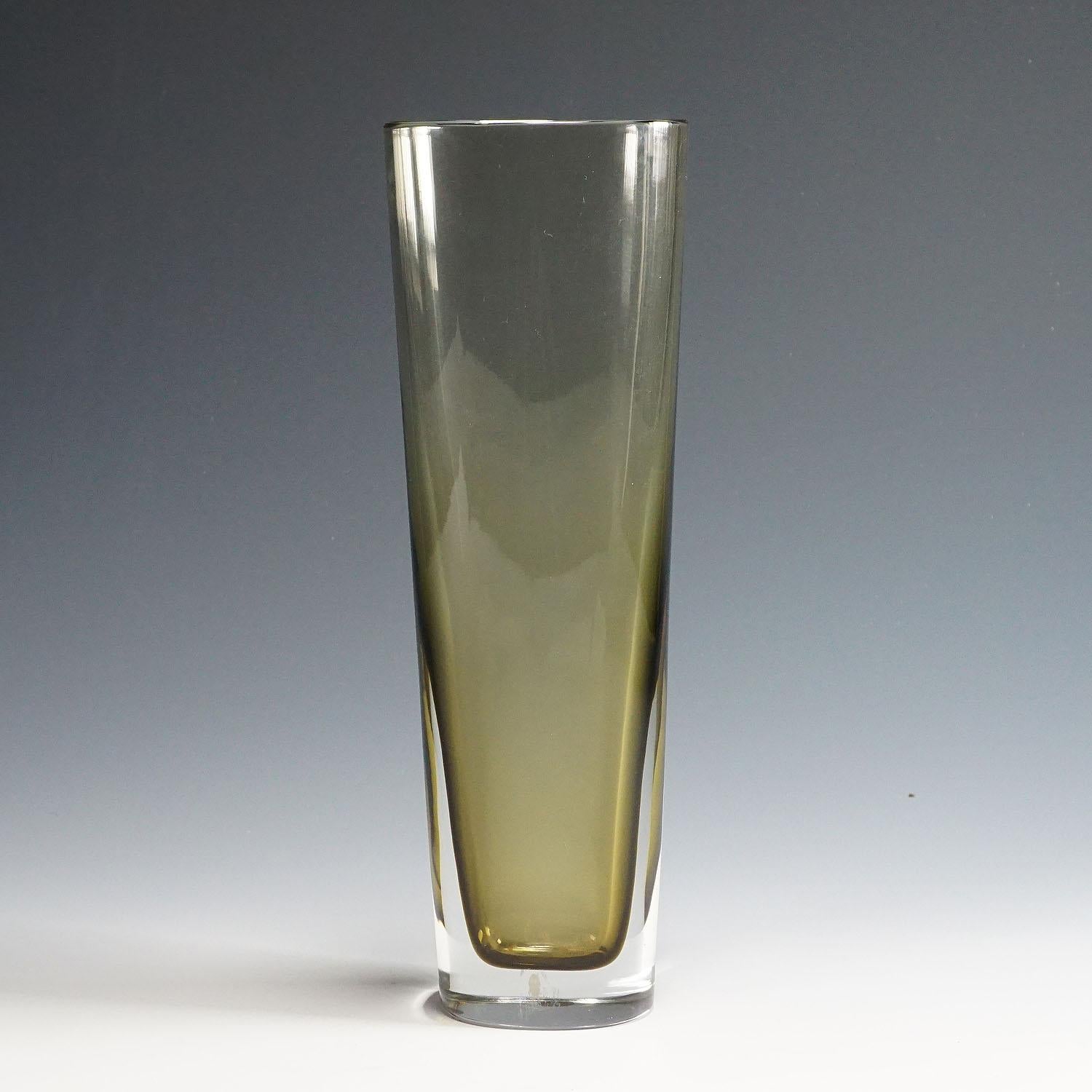 A large Venetian Sommerso glass vase manufactured by Seguso Vetri d'Arte and designed by Flavio Poli in the 1960s. Clear and grey Sommerso glass, polished rim. Rests of the 1960s Seguso label on the body. Signed 