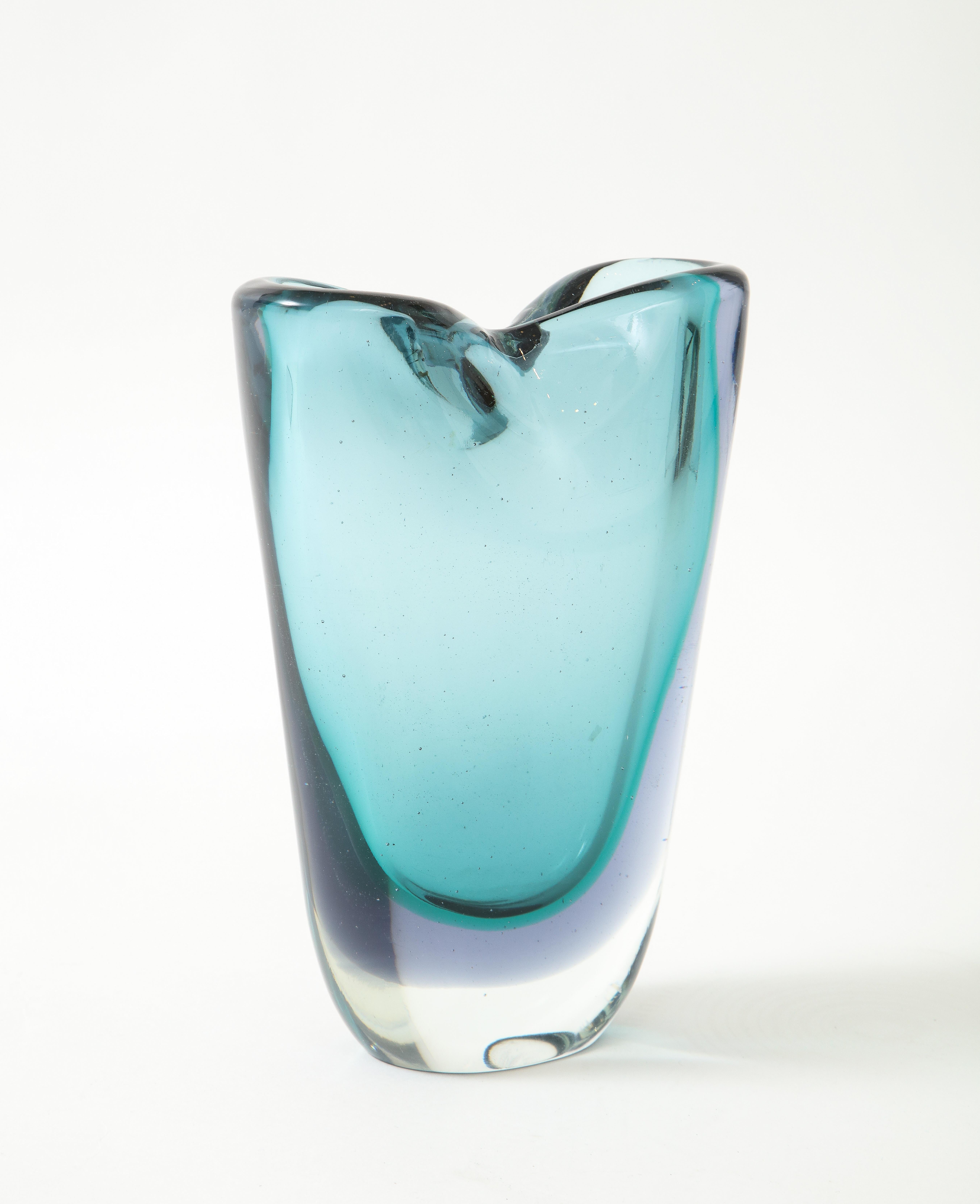 Flavio Poli for Seguso Vetri d'Arte exquisite pinched glass vase, Italy, 1950s. This Murano blown glass vase was made using the Sommerso technique in a subtle beautiful shade of aqua and blue gray. Although unsigned, it's documented in the Seguso
