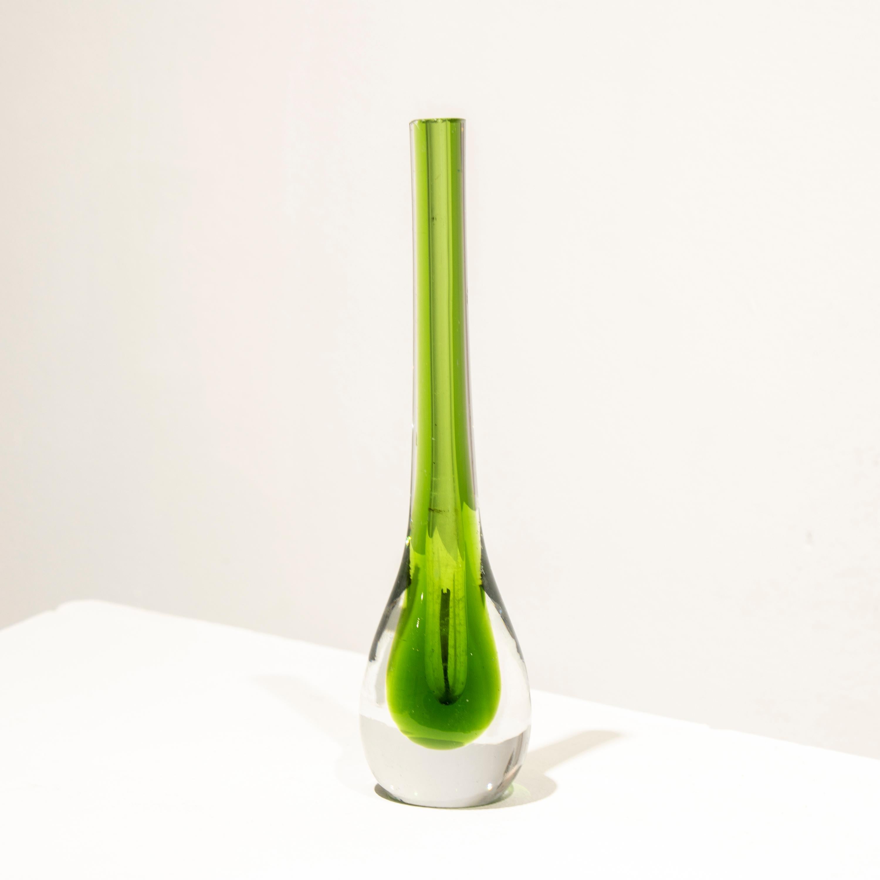 Italian small vase designed by Flavio Poli in the 1970's. The vase is hand-crafted in Murano glass with a tear-shape in green. 