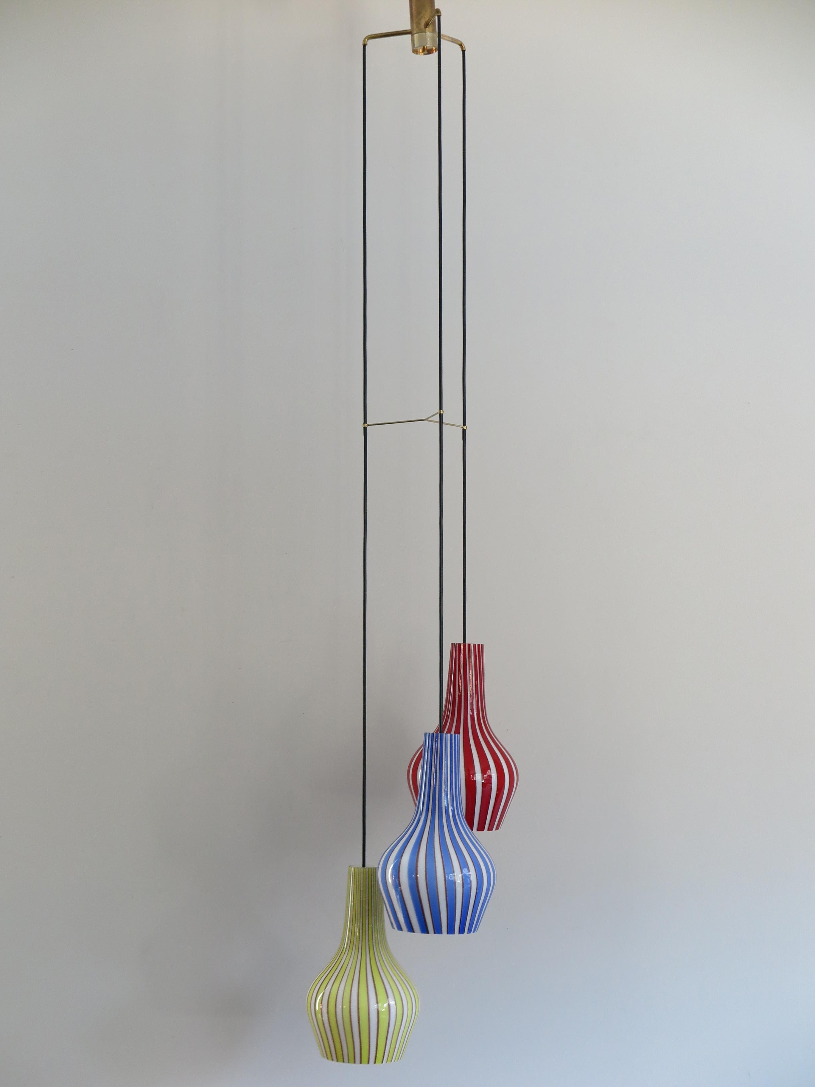 Tan France Auction Pick

Amazing and very rare Italian glass pendant lamp designed by Flavio Poli for Seguso Vetri d'Arte ‘Art glass’ with red, yellow and blue lined striped glass diffusers and with inner white casing, brass details, 1950s
29th