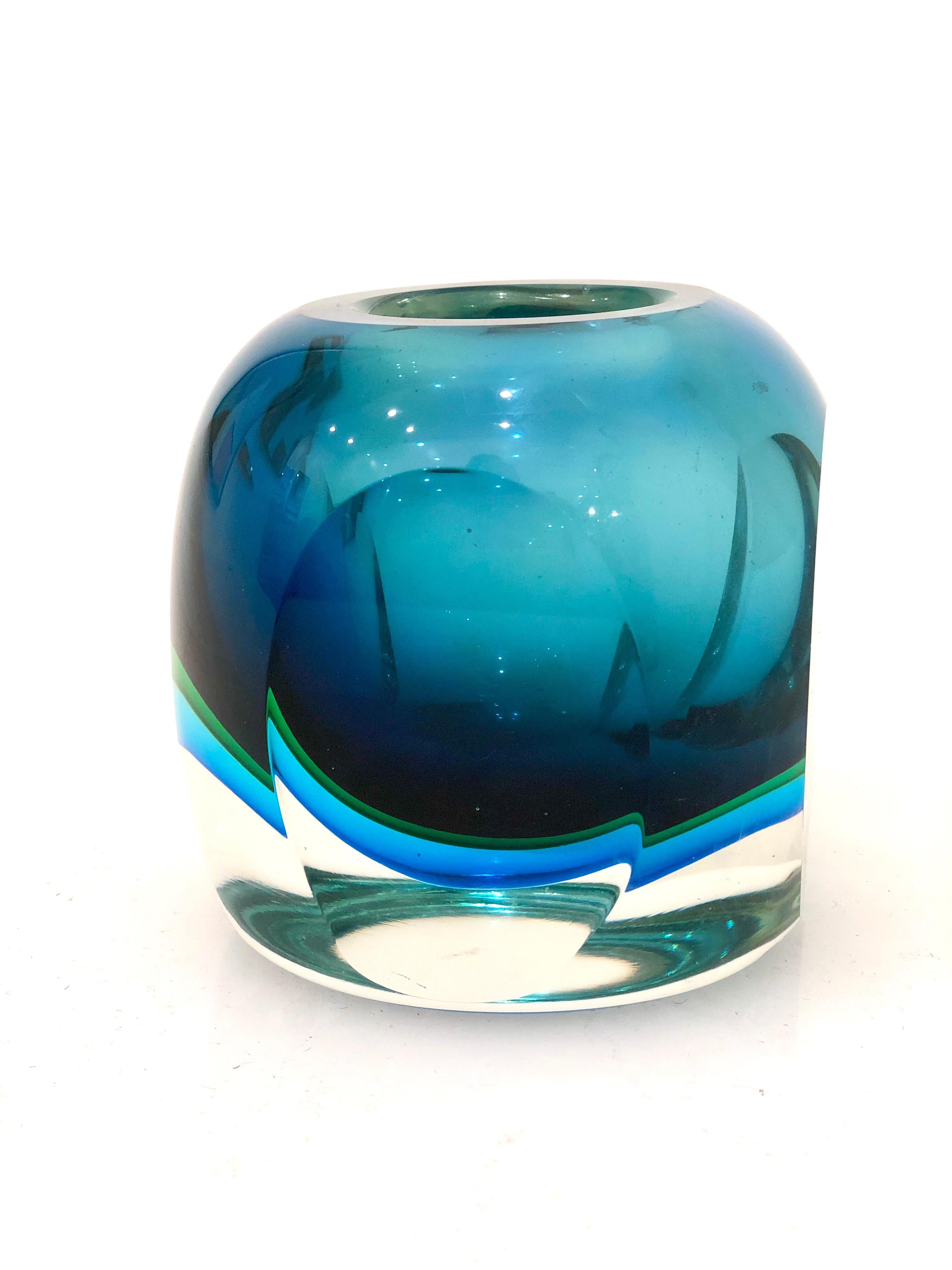 Beautiful deep colors and excellent condition on this 4 sided glass vase, circa 1950s.
